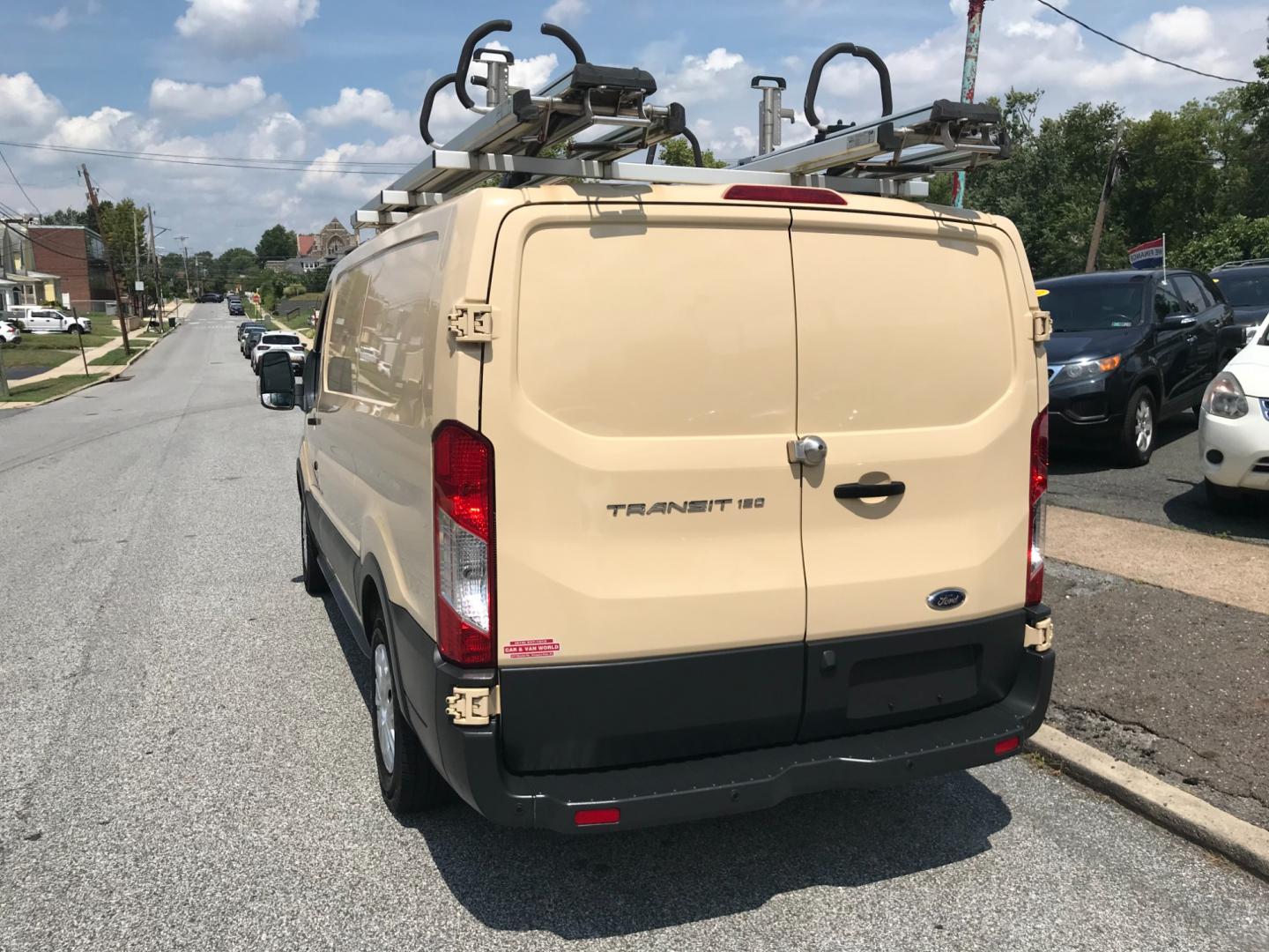 2017 Tan /Gray Ford Transit 150 (1FTYE1YM2HK) with an 3.7 V6 engine, Automatic transmission, located at 577 Chester Pike, Prospect Park, PA, 19076, (610) 237-1015, 39.886154, -75.302338 - 2017 Ford Transit 150 Low Roof: Nice ladder racks that drop down, multiple pieces of shelving, bulkhead, no windows, PA inspection, FLEET MAINTAINED, runs LIKE NEW! This vehicle comes inspected and has been given a bumper to bumper safety check. It is very clean, reliable, and well maintained. We - Photo#5
