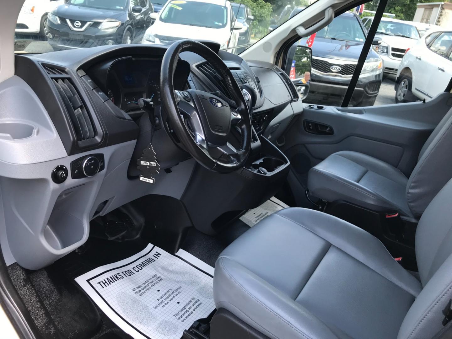 2017 Tan /Gray Ford Transit 150 (1FTYE1YM2HK) with an 3.7 V6 engine, Automatic transmission, located at 577 Chester Pike, Prospect Park, PA, 19076, (610) 237-1015, 39.886154, -75.302338 - 2017 Ford Transit 150 Low Roof: Nice ladder racks that drop down, multiple pieces of shelving, bulkhead, no windows, PA inspection, FLEET MAINTAINED, runs LIKE NEW! This vehicle comes inspected and has been given a bumper to bumper safety check. It is very clean, reliable, and well maintained. We - Photo#9