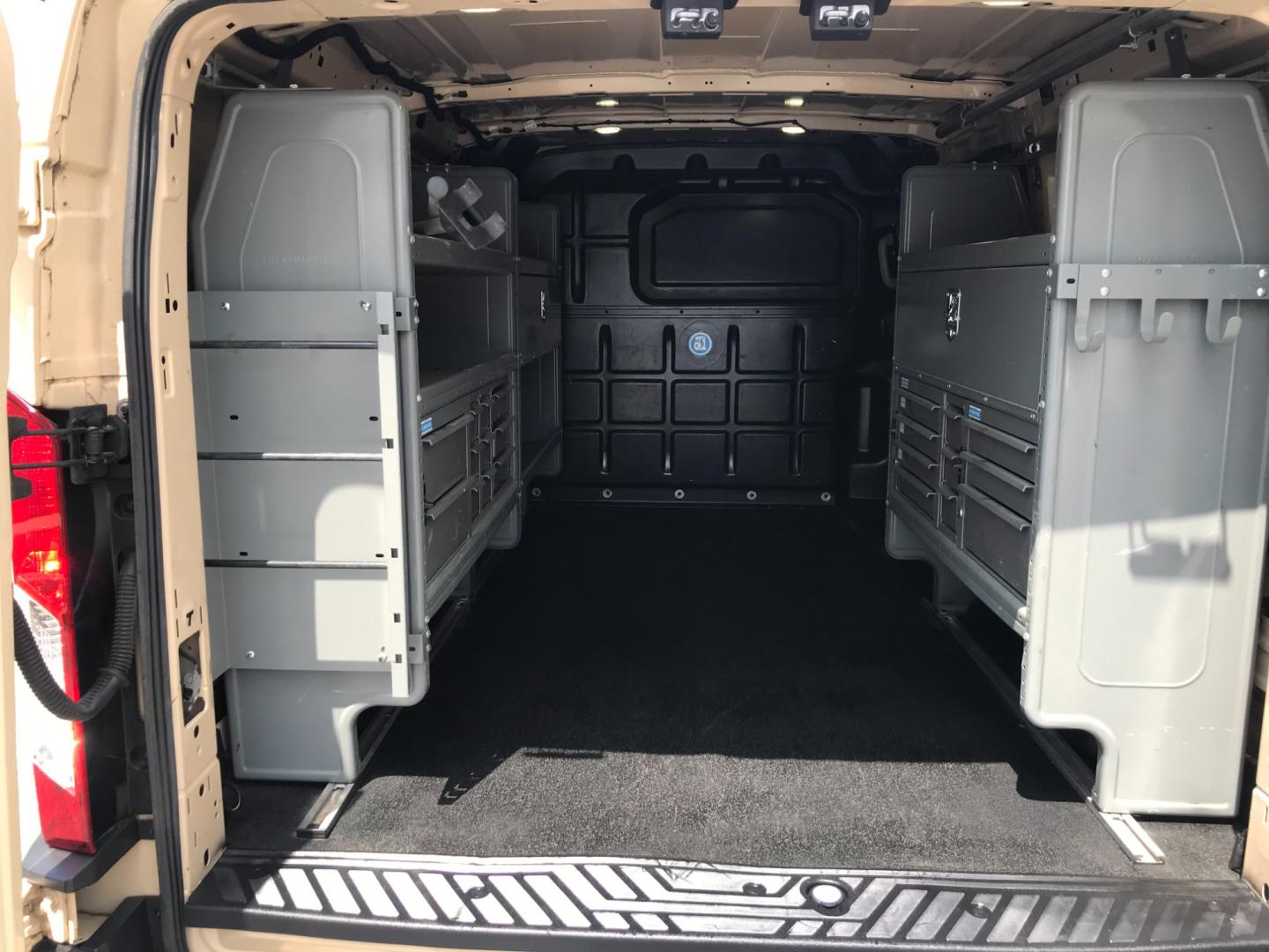 2017 Tan /Gray Ford Transit 150 (1FTYE1YM2HK) with an 3.7 V6 engine, Automatic transmission, located at 577 Chester Pike, Prospect Park, PA, 19076, (610) 237-1015, 39.886154, -75.302338 - 2017 Ford Transit 150 Low Roof: Nice ladder racks that drop down, multiple pieces of shelving, bulkhead, no windows, PA inspection, FLEET MAINTAINED, runs LIKE NEW! This vehicle comes inspected and has been given a bumper to bumper safety check. It is very clean, reliable, and well maintained. We - Photo#17