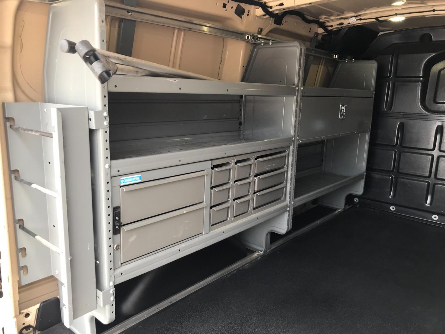 2017 Tan /Gray Ford Transit 150 (1FTYE1YM2HK) with an 3.7 V6 engine, Automatic transmission, located at 577 Chester Pike, Prospect Park, PA, 19076, (610) 237-1015, 39.886154, -75.302338 - 2017 Ford Transit 150 Low Roof: Nice ladder racks that drop down, multiple pieces of shelving, bulkhead, no windows, PA inspection, FLEET MAINTAINED, runs LIKE NEW! This vehicle comes inspected and has been given a bumper to bumper safety check. It is very clean, reliable, and well maintained. We - Photo#18
