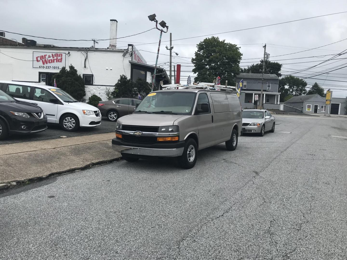 2014 Pewter /Gray Chevrolet Express 3500 Cargo (1GCZGTCG3E1) with an 6.0L V8 OHV 16V FFV engine, 6-Speed Automatic transmission, located at 577 Chester Pike, Prospect Park, PA, 19076, (610) 237-1015, 39.886154, -75.302338 - 2014 Chevrolet Express 3500 Cargo Van: Pop out side panels with remote, ladder racks, shelving, power inverter, trailer hitch, partition, new PA inspection, FLEET MAINTAINED, runs LIKE NEW! This vehicle comes inspected and has been given a bumper to bumper safety check. It is very clean, reliable - Photo#1