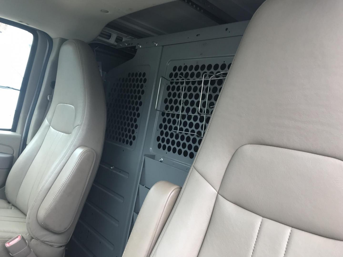 2014 Pewter /Gray Chevrolet Express 3500 Cargo (1GCZGTCG3E1) with an 6.0L V8 OHV 16V FFV engine, 6-Speed Automatic transmission, located at 577 Chester Pike, Prospect Park, PA, 19076, (610) 237-1015, 39.886154, -75.302338 - 2014 Chevrolet Express 3500 Cargo Van: Pop out side panels with remote, ladder racks, shelving, power inverter, trailer hitch, partition, new PA inspection, FLEET MAINTAINED, runs LIKE NEW! This vehicle comes inspected and has been given a bumper to bumper safety check. It is very clean, reliable - Photo#10