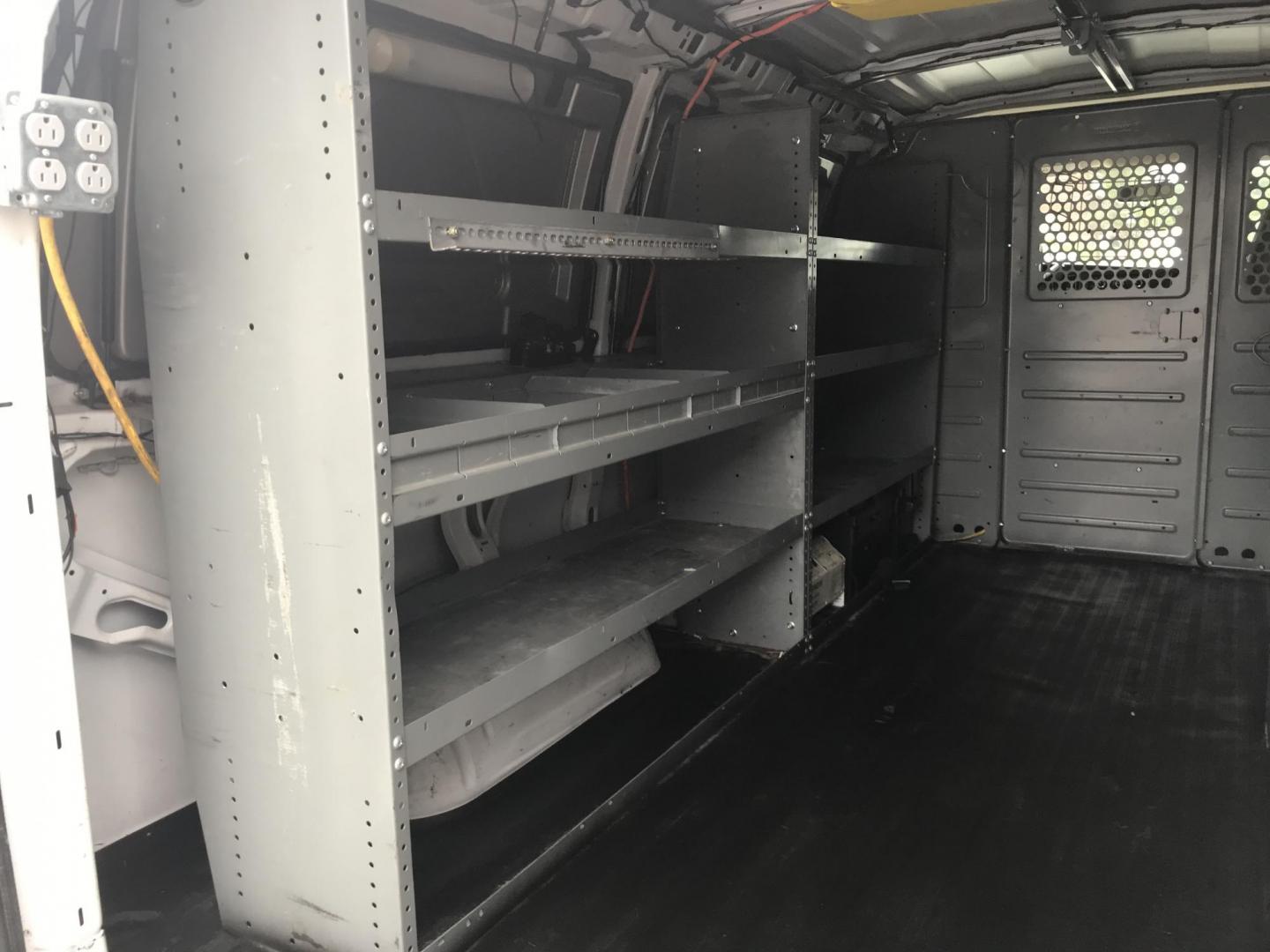 2014 Pewter /Gray Chevrolet Express 3500 Cargo (1GCZGTCG3E1) with an 6.0L V8 OHV 16V FFV engine, 6-Speed Automatic transmission, located at 577 Chester Pike, Prospect Park, PA, 19076, (610) 237-1015, 39.886154, -75.302338 - 2014 Chevrolet Express 3500 Cargo Van: Pop out side panels with remote, ladder racks, shelving, power inverter, trailer hitch, partition, new PA inspection, FLEET MAINTAINED, runs LIKE NEW! This vehicle comes inspected and has been given a bumper to bumper safety check. It is very clean, reliable - Photo#18