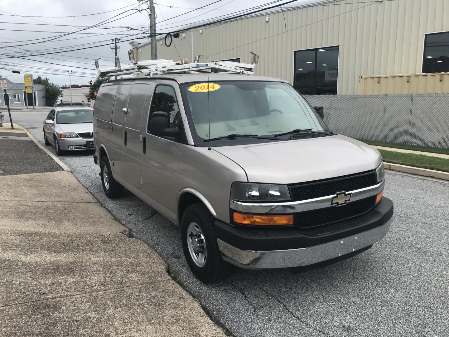 2014 Pewter /Gray Chevrolet Express 3500 Cargo (1GCZGTCG3E1) with an 6.0L V8 OHV 16V FFV engine, 6-Speed Automatic transmission, located at 577 Chester Pike, Prospect Park, PA, 19076, (610) 237-1015, 39.886154, -75.302338 - 2014 Chevrolet Express 3500 Cargo Van: Pop out side panels with remote, ladder racks, shelving, power inverter, trailer hitch, partition, new PA inspection, FLEET MAINTAINED, runs LIKE NEW! This vehicle comes inspected and has been given a bumper to bumper safety check. It is very clean, reliable - Photo#3
