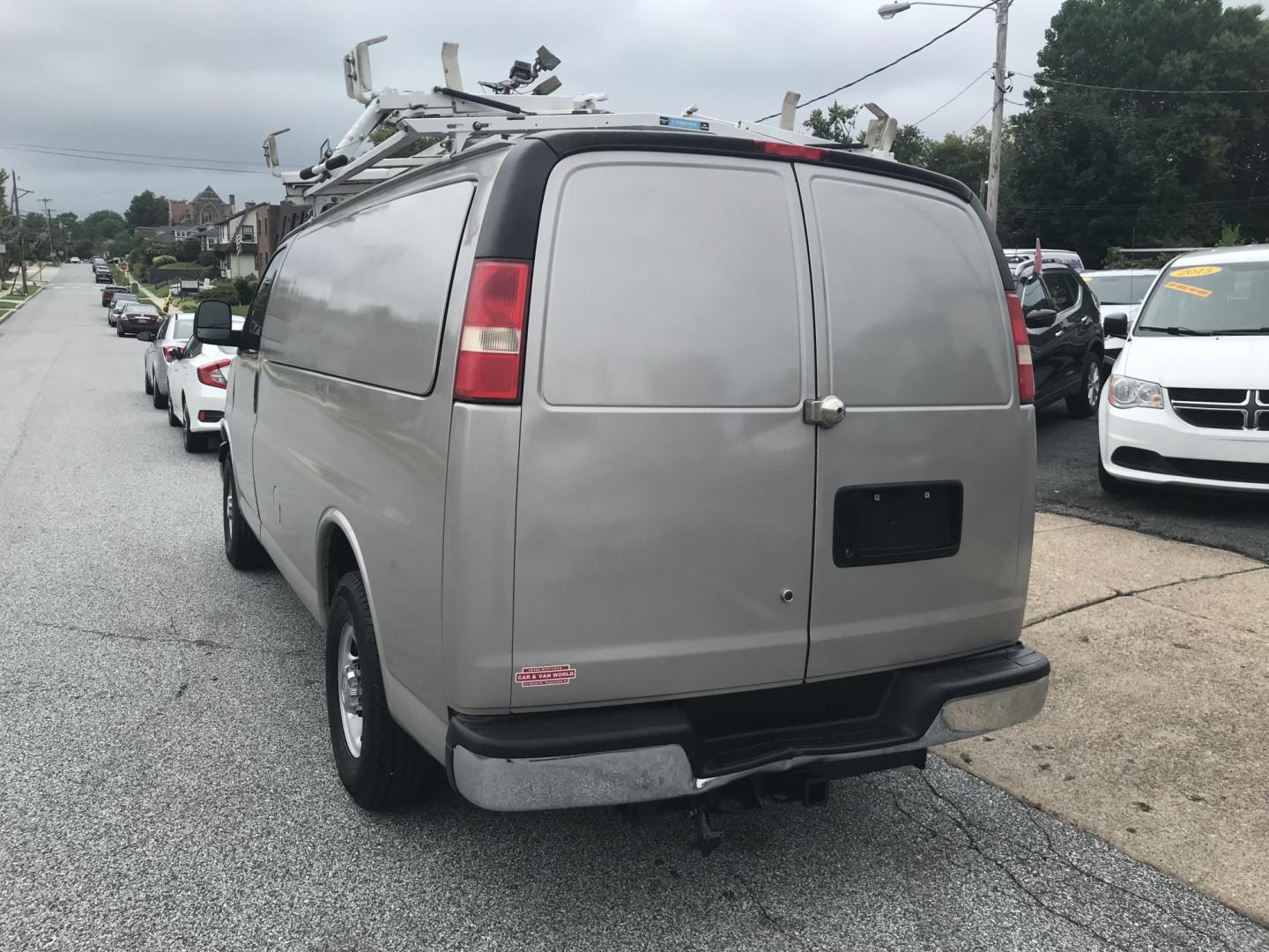 2014 Pewter /Gray Chevrolet Express 3500 Cargo (1GCZGTCG3E1) with an 6.0L V8 OHV 16V FFV engine, 6-Speed Automatic transmission, located at 577 Chester Pike, Prospect Park, PA, 19076, (610) 237-1015, 39.886154, -75.302338 - 2014 Chevrolet Express 3500 Cargo Van: Pop out side panels with remote, ladder racks, shelving, power inverter, trailer hitch, partition, new PA inspection, FLEET MAINTAINED, runs LIKE NEW! This vehicle comes inspected and has been given a bumper to bumper safety check. It is very clean, reliable - Photo#4