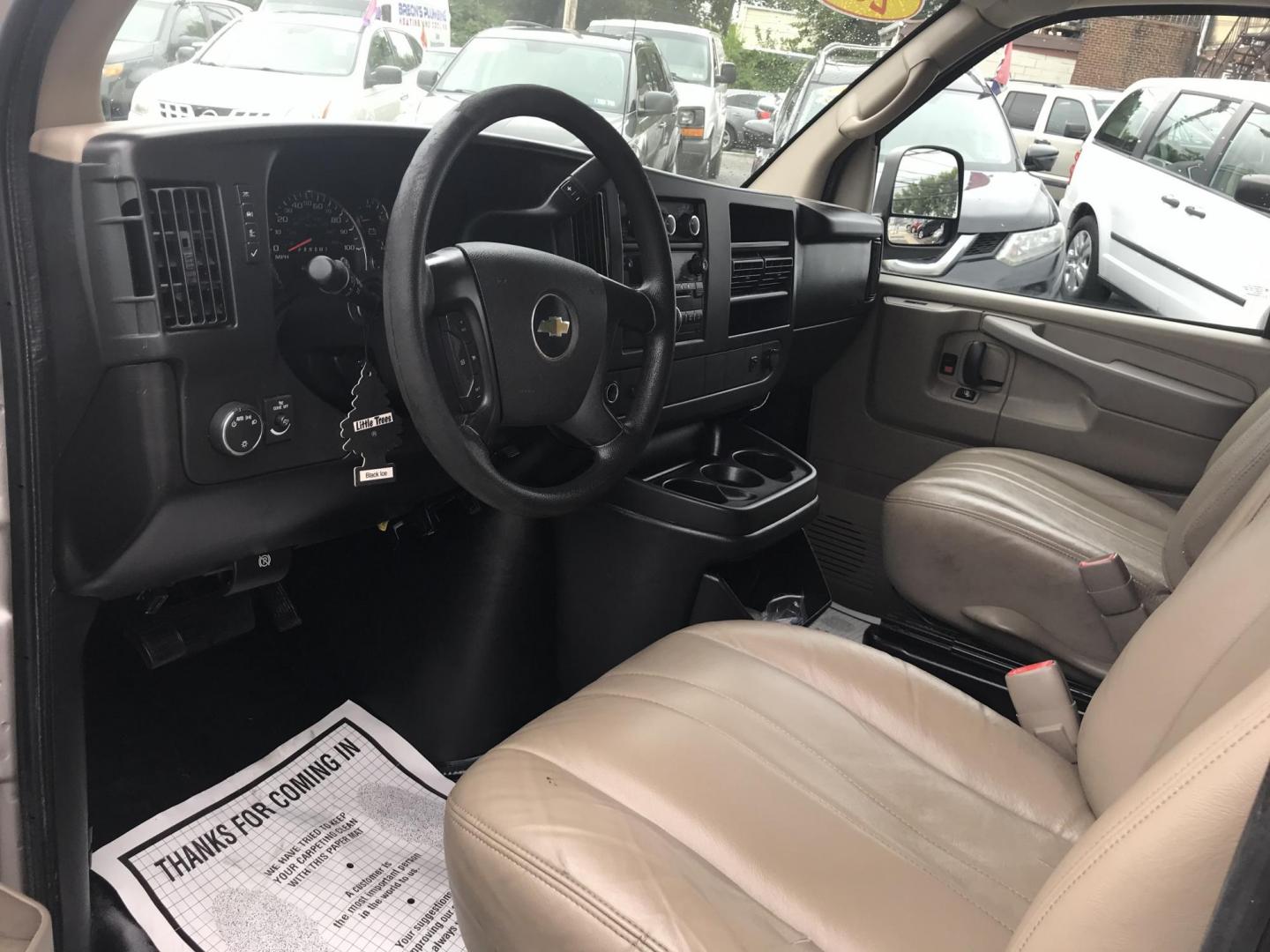 2014 Pewter /Gray Chevrolet Express 3500 Cargo (1GCZGTCG3E1) with an 6.0L V8 OHV 16V FFV engine, 6-Speed Automatic transmission, located at 577 Chester Pike, Prospect Park, PA, 19076, (610) 237-1015, 39.886154, -75.302338 - 2014 Chevrolet Express 3500 Cargo Van: Pop out side panels with remote, ladder racks, shelving, power inverter, trailer hitch, partition, new PA inspection, FLEET MAINTAINED, runs LIKE NEW! This vehicle comes inspected and has been given a bumper to bumper safety check. It is very clean, reliable - Photo#5