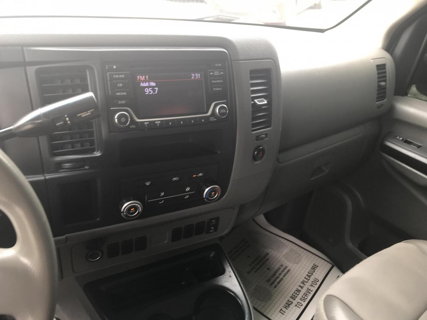 2018 White /Gray Nissan NV Cargo 1500 S (1N6BF0KM4JN) with an 4.0L V6 engine, 5A transmission, located at 577 Chester Pike, Prospect Park, PA, 19076, (610) 237-1015, 39.886154, -75.302338 - 2018 Nissan NV 1500 S: Shelving, backup camera, new PA inspection, heavy duty partition, FLEET MAINTAINED, runs LIKE NEW! This vehicle comes inspected and has been given a bumper to bumper safety check. It is very clean, reliable, and well maintained. We offer a unique pay plan that is known for - Photo#11