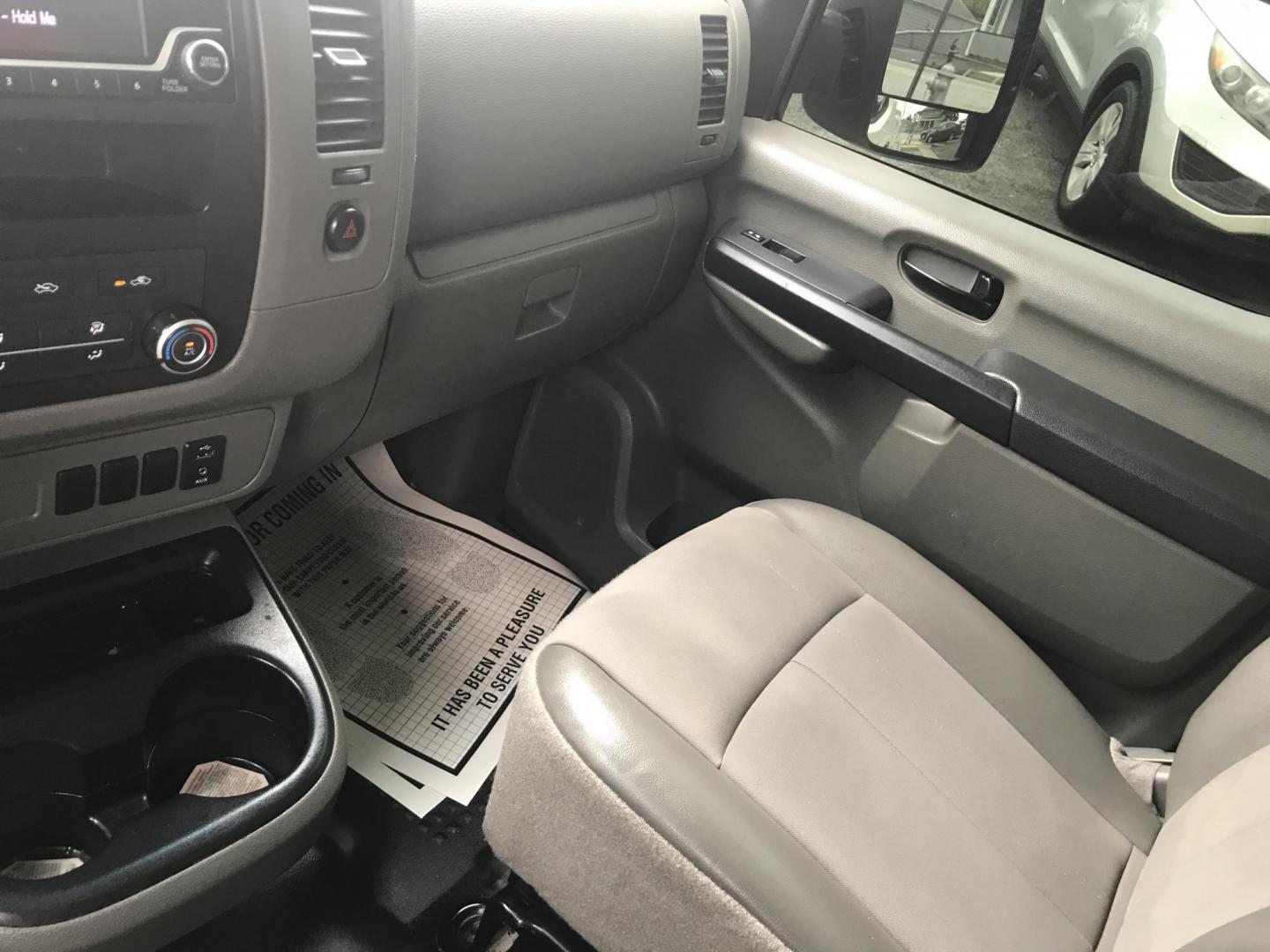 2018 White /Gray Nissan NV Cargo 1500 S (1N6BF0KM4JN) with an 4.0L V6 engine, 5A transmission, located at 577 Chester Pike, Prospect Park, PA, 19076, (610) 237-1015, 39.886154, -75.302338 - 2018 Nissan NV 1500 S: Shelving, backup camera, new PA inspection, heavy duty partition, FLEET MAINTAINED, runs LIKE NEW! This vehicle comes inspected and has been given a bumper to bumper safety check. It is very clean, reliable, and well maintained. We offer a unique pay plan that is known for - Photo#16