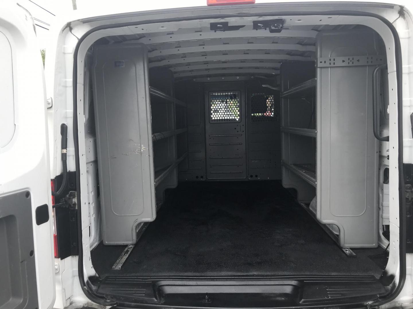 2018 White /Gray Nissan NV Cargo 1500 S (1N6BF0KM4JN) with an 4.0L V6 engine, 5A transmission, located at 577 Chester Pike, Prospect Park, PA, 19076, (610) 237-1015, 39.886154, -75.302338 - 2018 Nissan NV 1500 S: Shelving, backup camera, new PA inspection, heavy duty partition, FLEET MAINTAINED, runs LIKE NEW! This vehicle comes inspected and has been given a bumper to bumper safety check. It is very clean, reliable, and well maintained. We offer a unique pay plan that is known for - Photo#19