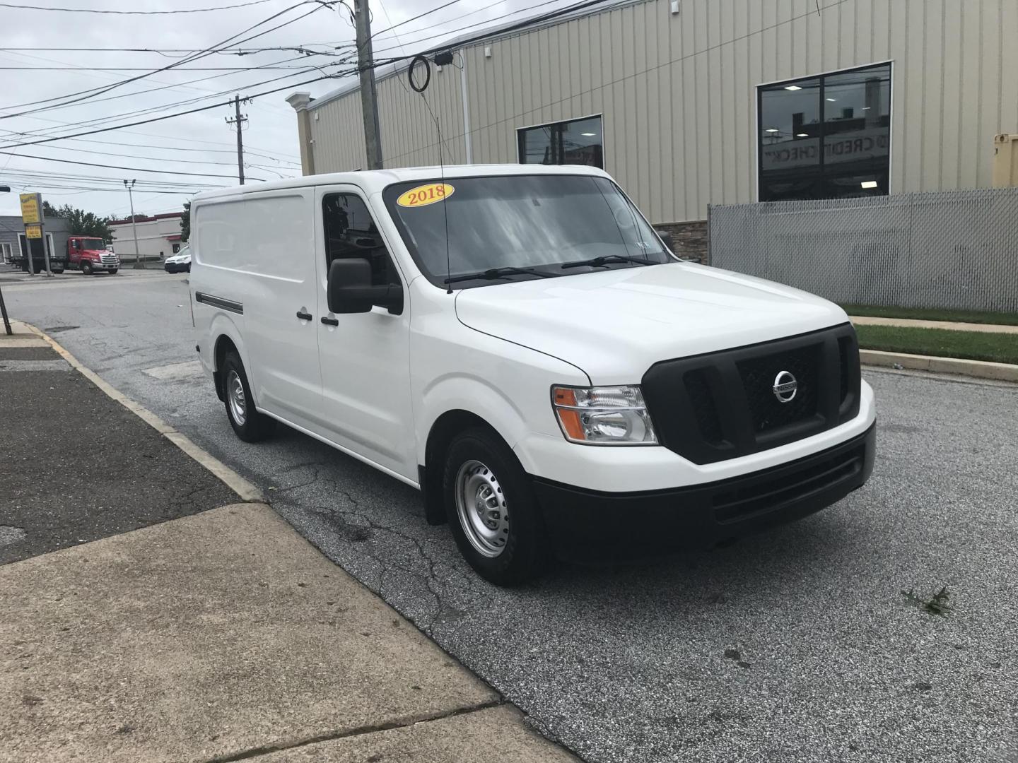 2018 White /Gray Nissan NV Cargo 1500 S (1N6BF0KM4JN) with an 4.0L V6 engine, 5A transmission, located at 577 Chester Pike, Prospect Park, PA, 19076, (610) 237-1015, 39.886154, -75.302338 - 2018 Nissan NV 1500 S: Shelving, backup camera, new PA inspection, heavy duty partition, FLEET MAINTAINED, runs LIKE NEW! This vehicle comes inspected and has been given a bumper to bumper safety check. It is very clean, reliable, and well maintained. We offer a unique pay plan that is known for - Photo#3