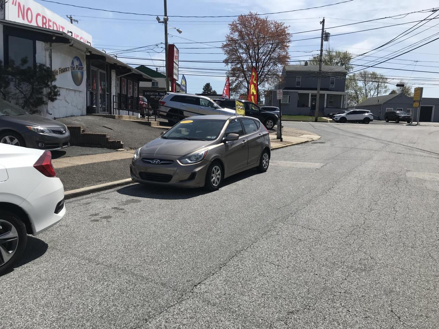 2014 Gold /Tan Hyundai Accent GS 5-Door (KMHCT5AE9EU) with an 1.6L L4 DOHC 16V engine, Automatic transmission, located at 577 Chester Pike, Prospect Park, PA, 19076, (610) 237-1015, 39.886154, -75.302338 - 2014 Hyundai Accent GS: Only 95k miles, new PA inspection, great on gas, runs EXCELLENT! This vehicle comes inspected and has been given a bumper to bumper safety check. It is very clean, reliable, and well maintained. We offer a unique pay plan that is known for being the easiest and fastest fin - Photo#1