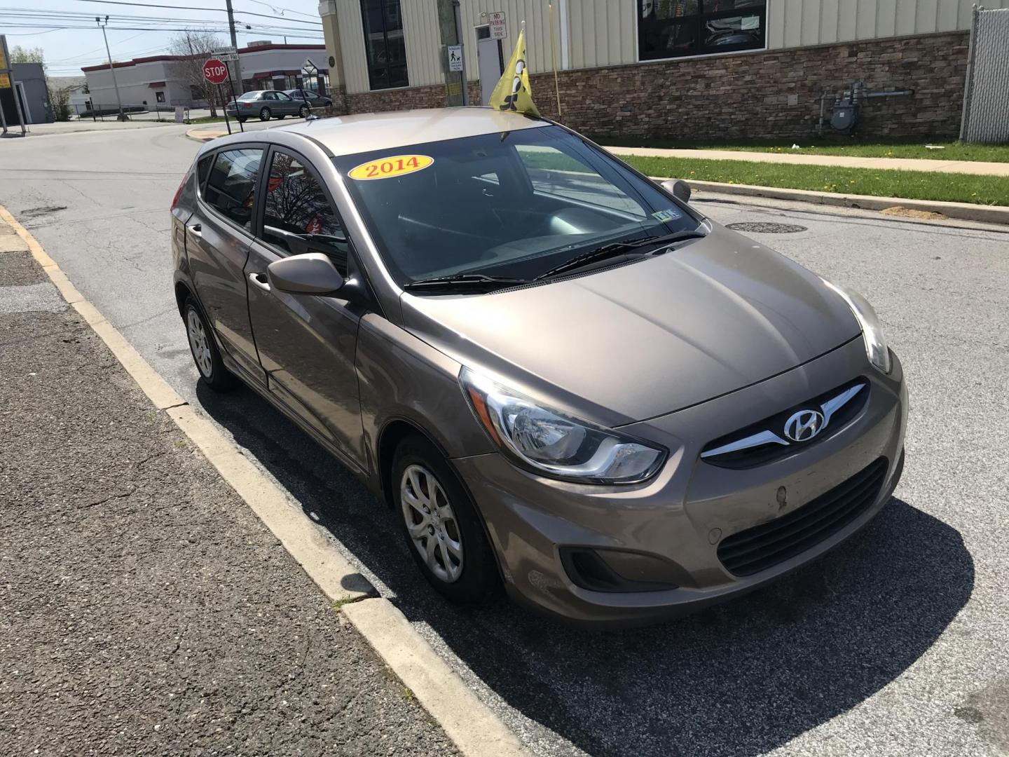 2014 Gold /Tan Hyundai Accent GS 5-Door (KMHCT5AE9EU) with an 1.6L L4 DOHC 16V engine, Automatic transmission, located at 577 Chester Pike, Prospect Park, PA, 19076, (610) 237-1015, 39.886154, -75.302338 - 2014 Hyundai Accent GS: Only 95k miles, new PA inspection, great on gas, runs EXCELLENT! This vehicle comes inspected and has been given a bumper to bumper safety check. It is very clean, reliable, and well maintained. We offer a unique pay plan that is known for being the easiest and fastest fin - Photo#2