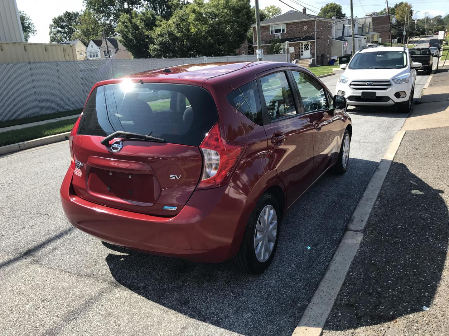 2014 Red /Gray Nissan Versa Note S (3N1CE2CP5EL) with an 1.6L L4 DOHC 16V engine, Automatic transmission, located at 577 Chester Pike, Prospect Park, PA, 19076, (610) 237-1015, 39.886154, -75.302338 - 2014 Nissan Versa Note SV: Only 90k miles, great on gas, new PA inspection, SUPER CLEAN, runs LIKE NEW! This vehicle comes inspected and has been given a bumper to bumper safety check. It is very clean, reliable, and well maintained. We offer a unique pay plan that is known for being the easiest - Photo#4