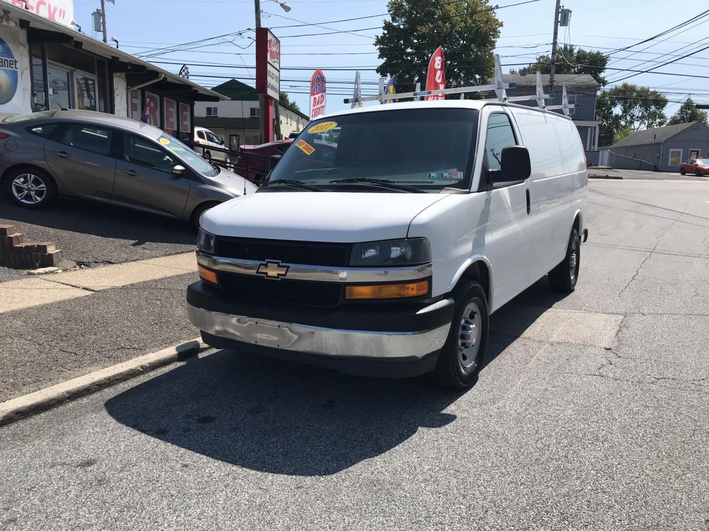 2017 White /Gray Chevrolet Express 2500 Cargo (1GCWGAFF8H1) with an 4.8L V8 FFV engine, 6A transmission, located at 577 Chester Pike, Prospect Park, PA, 19076, (610) 237-1015, 39.886154, -75.302338 - 2017 Chevy Express 2500 Cargo Van: Ladder racks, shelving, no windows, new PA inspection, FLEET MAINTAINED, runs LIKE NEW! This vehicle comes inspected and has been given a bumper to bumper safety check. It is very clean, reliable, and well maintained. We offer a unique pay plan that is known for - Photo#1