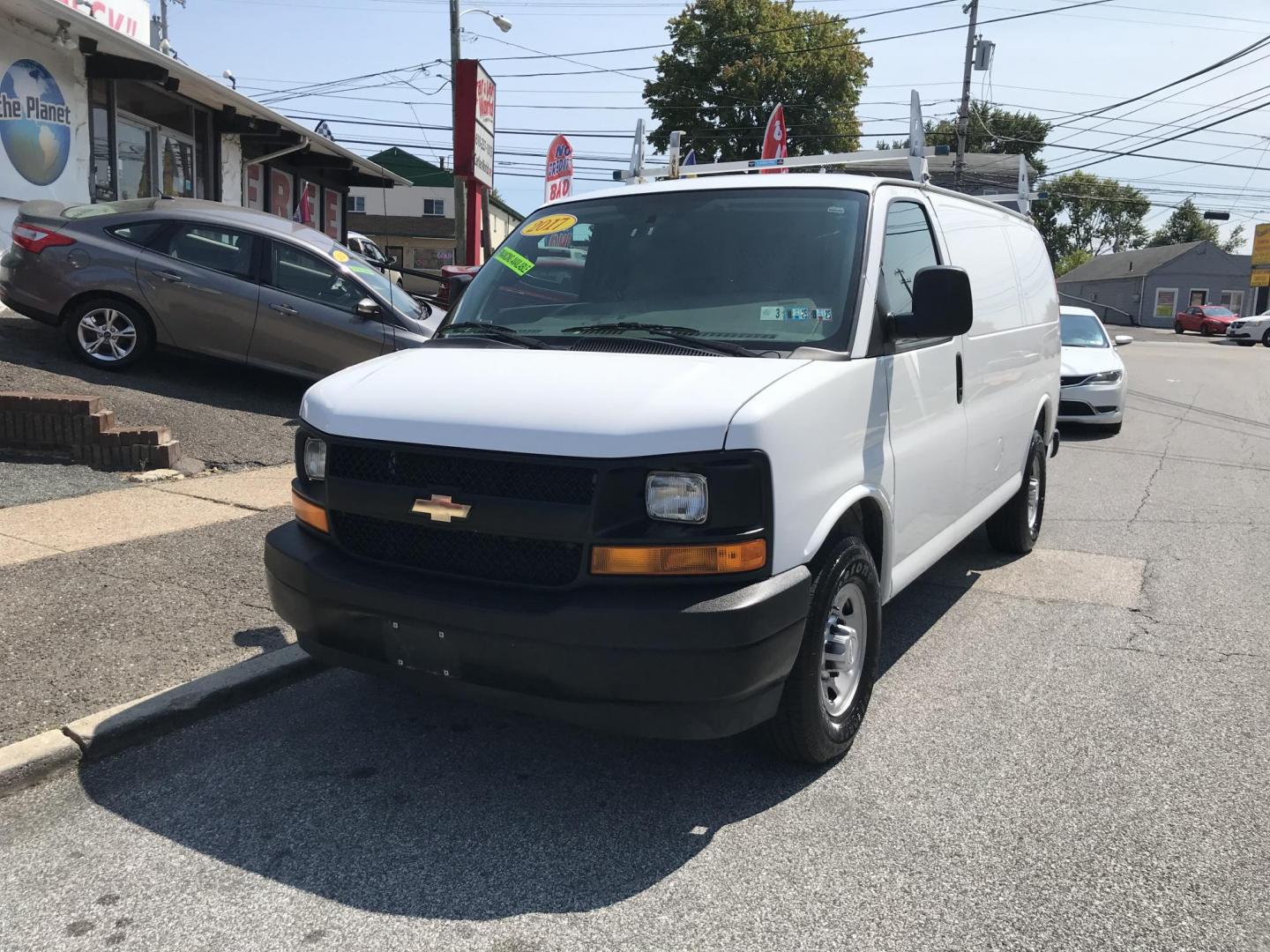 2017 White /Gray Chevrolet Express 2500 Cargo (1GCWGAFF7H1) with an 4.8L V8 FFV engine, 6A transmission, located at 577 Chester Pike, Prospect Park, PA, 19076, (610) 237-1015, 39.886154, -75.302338 - 2017 Chevrolet Express 2500 Cargo Van: Ladder racks, shelving, backup camera, partition, new PA inspection, FLEET MAINTAINED, runs LIKE NEW! This vehicle comes inspected and has been given a bumper to bumper safety check. It is very clean, reliable, and well maintained. We offer a unique pay plan - Photo#1