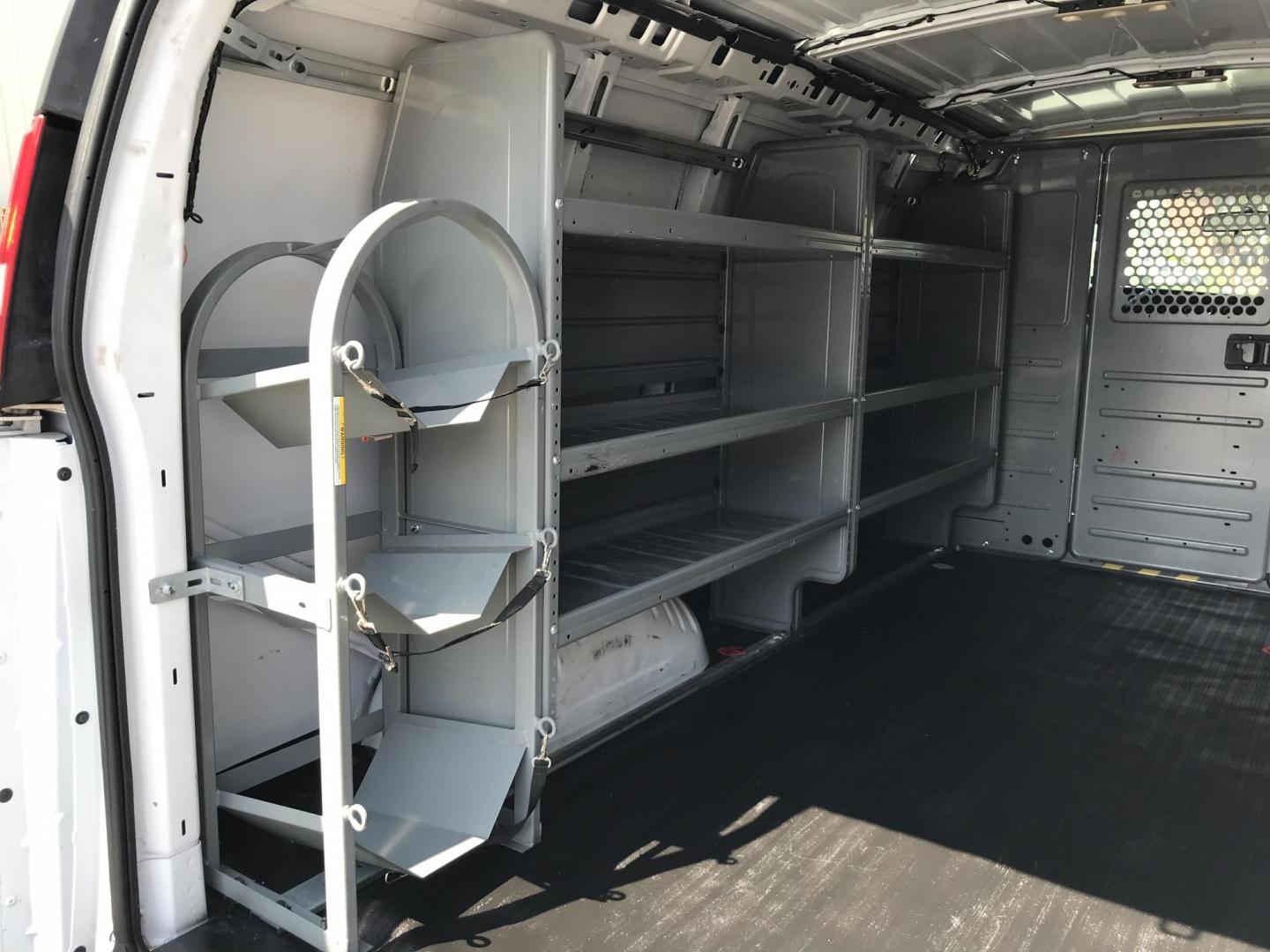 2017 White /Gray Chevrolet Express 2500 Cargo (1GCWGAFF7H1) with an 4.8L V8 FFV engine, 6A transmission, located at 577 Chester Pike, Prospect Park, PA, 19076, (610) 237-1015, 39.886154, -75.302338 - 2017 Chevrolet Express 2500 Cargo Van: Ladder racks, shelving, backup camera, partition, new PA inspection, FLEET MAINTAINED, runs LIKE NEW! This vehicle comes inspected and has been given a bumper to bumper safety check. It is very clean, reliable, and well maintained. We offer a unique pay plan - Photo#17