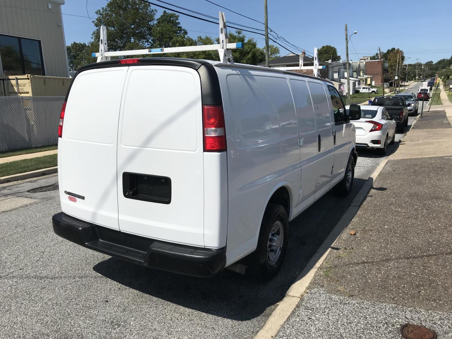 2017 White /Gray Chevrolet Express 2500 Cargo (1GCWGAFF7H1) with an 4.8L V8 FFV engine, 6A transmission, located at 577 Chester Pike, Prospect Park, PA, 19076, (610) 237-1015, 39.886154, -75.302338 - 2017 Chevrolet Express 2500 Cargo Van: Ladder racks, shelving, backup camera, partition, new PA inspection, FLEET MAINTAINED, runs LIKE NEW! This vehicle comes inspected and has been given a bumper to bumper safety check. It is very clean, reliable, and well maintained. We offer a unique pay plan - Photo#4