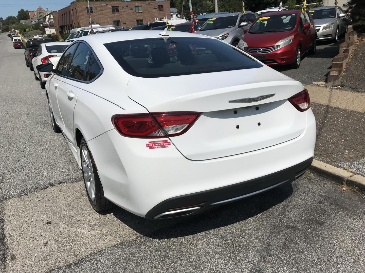 2016 White /Gray Chrysler 200 Limited (1C3CCCAG1GN) with an 3.6L V6 DOHC 24V FFV engine, 9A transmission, located at 577 Chester Pike, Prospect Park, PA, 19076, (610) 237-1015, 39.886154, -75.302338 - Photo#4