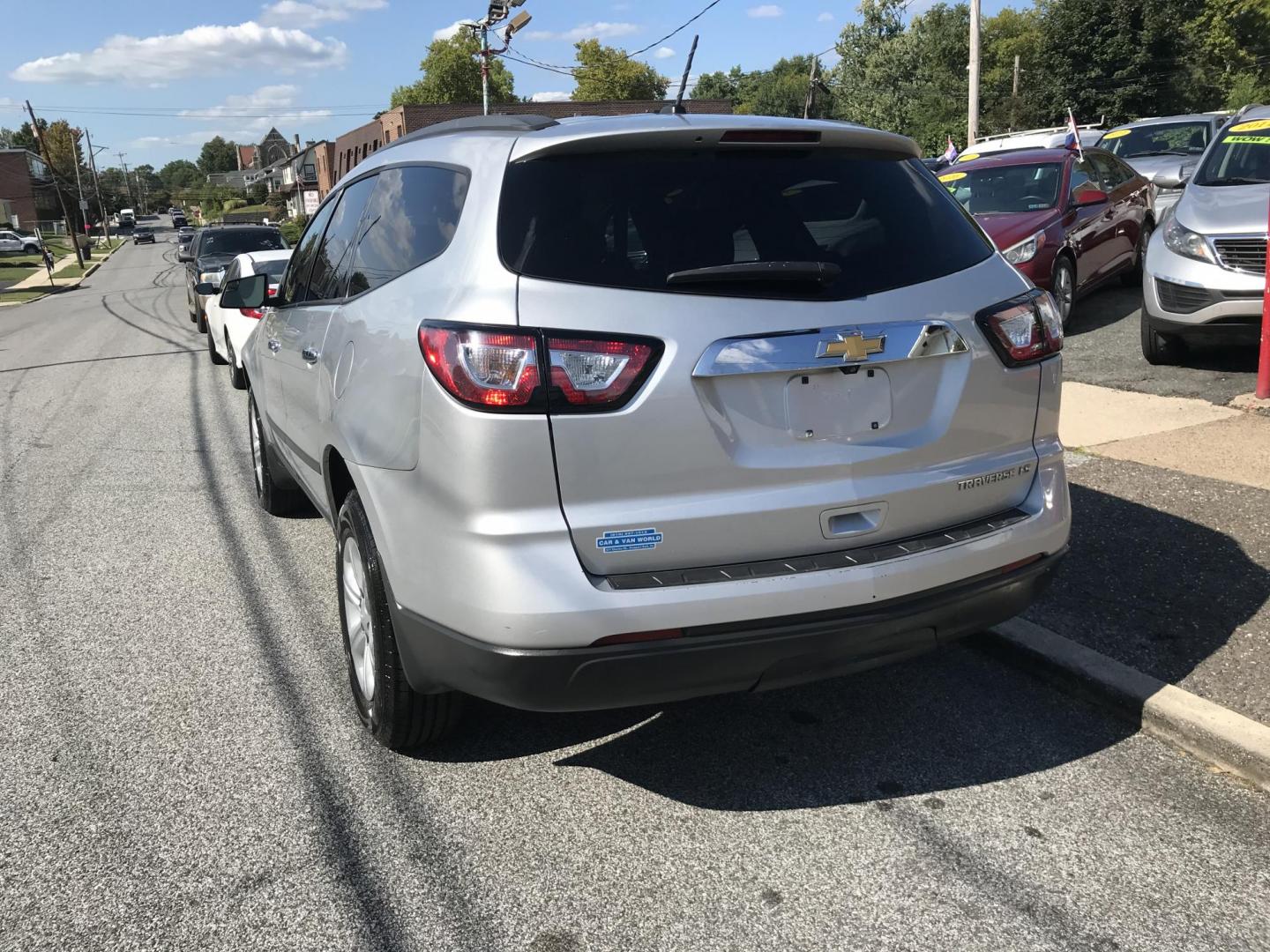 2014 Silver /Gray Chevrolet Traverse LS FWD w/PDC (1GNKRFED8EJ) with an 3.6L V6 DOHC 24V engine, 6-Speed Automatic transmission, located at 577 Chester Pike, Prospect Park, PA, 19076, (610) 237-1015, 39.886154, -75.302338 - Photo#5