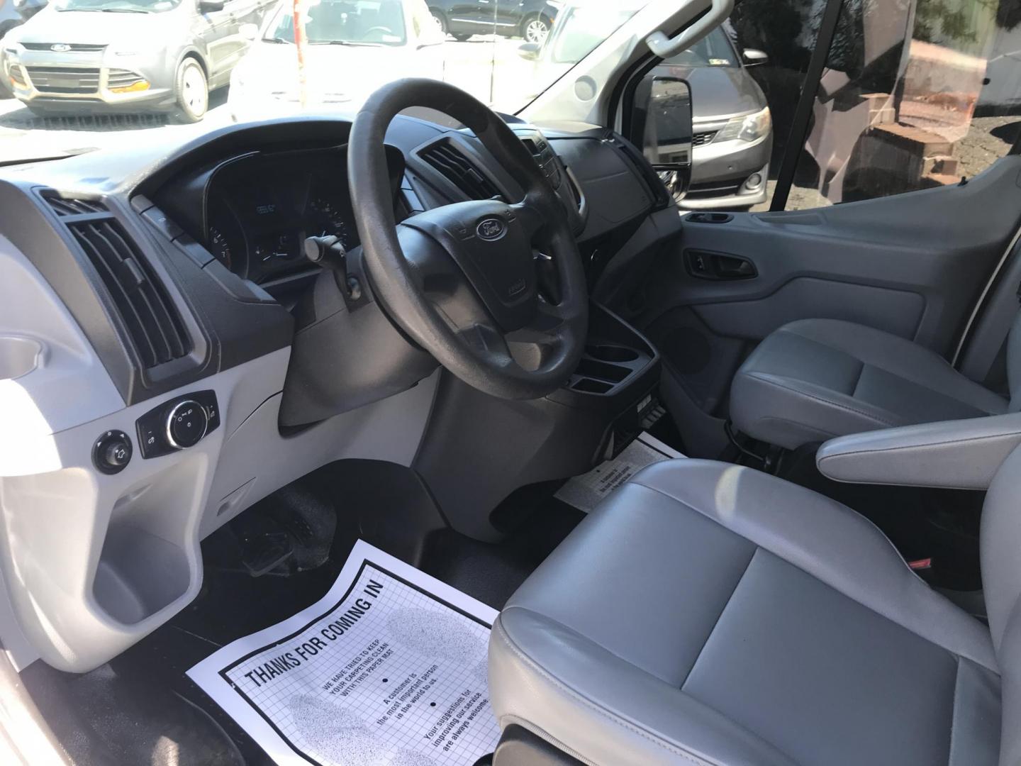 2015 White /Gray Ford Transit 150 Van Low Roof w/Sliding Pass. 130-in. WB (1FTNE1YM7FK) with an 3.7L V6 DOHC 24V engine, 6-Speed Automatic transmission, located at 577 Chester Pike, Prospect Park, PA, 19076, (610) 237-1015, 39.886154, -75.302338 - 2015 Ford Transit 150 Low Roof: Only 139k miles, ladder racks, multiple pieces of shelving, partition, FLEET MAINTAINED, runs LIKE NEW! This vehicle comes inspected and has been given a bumper to bumper safety check. It is very clean, reliable, and well maintained. We offer a unique pay plan that - Photo#4