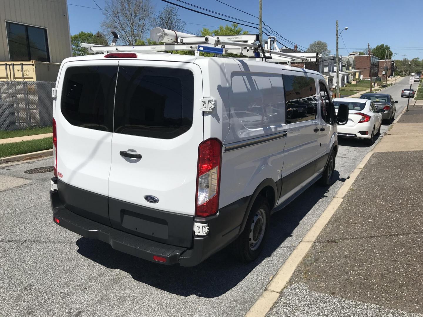 2015 White /Gray Ford Transit 150 Van Low Roof w/Sliding Pass. 130-in. WB (1FTNE1YM7FK) with an 3.7L V6 DOHC 24V engine, 6-Speed Automatic transmission, located at 577 Chester Pike, Prospect Park, PA, 19076, (610) 237-1015, 39.886154, -75.302338 - 2015 Ford Transit 150 Low Roof: Only 139k miles, ladder racks, multiple pieces of shelving, partition, FLEET MAINTAINED, runs LIKE NEW! This vehicle comes inspected and has been given a bumper to bumper safety check. It is very clean, reliable, and well maintained. We offer a unique pay plan that - Photo#6