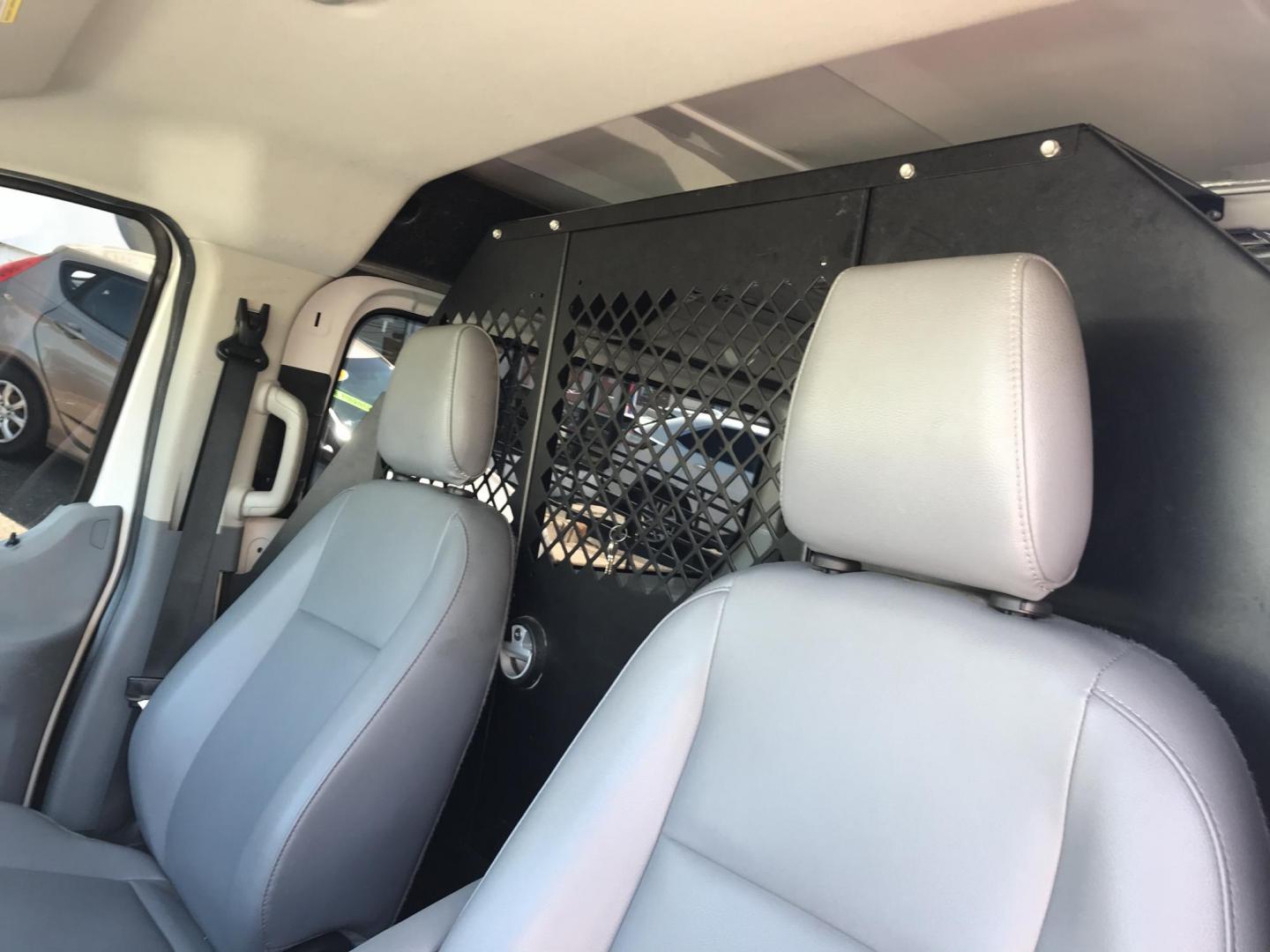 2015 White /Gray Ford Transit 150 Van Low Roof w/Sliding Pass. 130-in. WB (1FTNE1YM7FK) with an 3.7L V6 DOHC 24V engine, 6-Speed Automatic transmission, located at 577 Chester Pike, Prospect Park, PA, 19076, (610) 237-1015, 39.886154, -75.302338 - 2015 Ford Transit 150 Low Roof: Only 139k miles, ladder racks, multiple pieces of shelving, partition, FLEET MAINTAINED, runs LIKE NEW! This vehicle comes inspected and has been given a bumper to bumper safety check. It is very clean, reliable, and well maintained. We offer a unique pay plan that - Photo#9