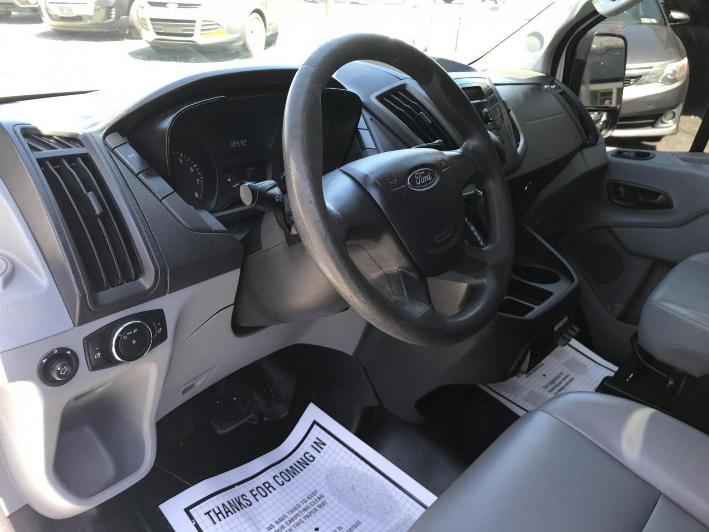 2015 White /Gray Ford Transit 150 Van Low Roof w/Sliding Pass. 130-in. WB (1FTNE1YM7FK) with an 3.7L V6 DOHC 24V engine, 6-Speed Automatic transmission, located at 577 Chester Pike, Prospect Park, PA, 19076, (610) 237-1015, 39.886154, -75.302338 - 2015 Ford Transit 150 Low Roof: Only 139k miles, ladder racks, multiple pieces of shelving, partition, FLEET MAINTAINED, runs LIKE NEW! This vehicle comes inspected and has been given a bumper to bumper safety check. It is very clean, reliable, and well maintained. We offer a unique pay plan that - Photo#10