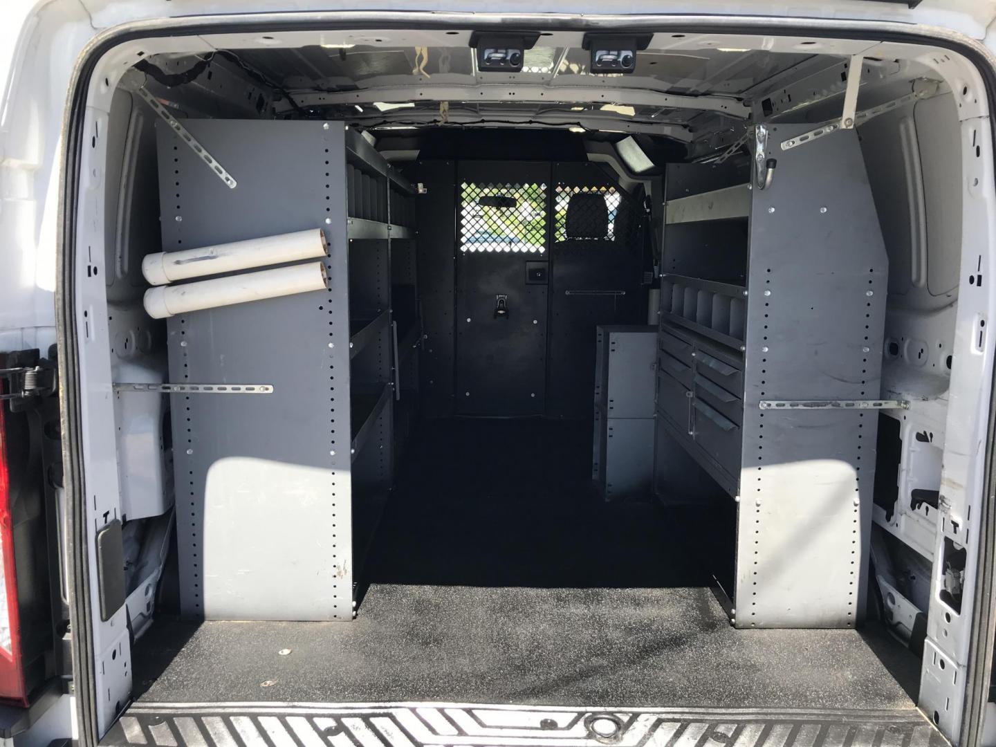 2015 White /Gray Ford Transit 150 Van Low Roof w/Sliding Pass. 130-in. WB (1FTNE1YM7FK) with an 3.7L V6 DOHC 24V engine, 6-Speed Automatic transmission, located at 577 Chester Pike, Prospect Park, PA, 19076, (610) 237-1015, 39.886154, -75.302338 - 2015 Ford Transit 150 Low Roof: Only 139k miles, ladder racks, multiple pieces of shelving, partition, FLEET MAINTAINED, runs LIKE NEW! This vehicle comes inspected and has been given a bumper to bumper safety check. It is very clean, reliable, and well maintained. We offer a unique pay plan that - Photo#11
