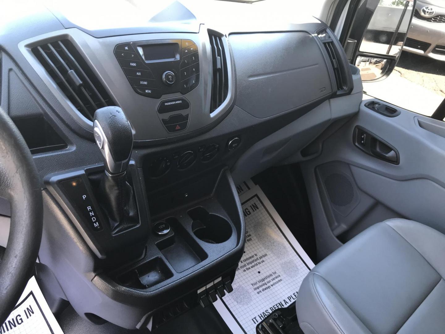 2015 White /Gray Ford Transit 150 Van Low Roof w/Sliding Pass. 130-in. WB (1FTNE1YM7FK) with an 3.7L V6 DOHC 24V engine, 6-Speed Automatic transmission, located at 577 Chester Pike, Prospect Park, PA, 19076, (610) 237-1015, 39.886154, -75.302338 - 2015 Ford Transit 150 Low Roof: Only 139k miles, ladder racks, multiple pieces of shelving, partition, FLEET MAINTAINED, runs LIKE NEW! This vehicle comes inspected and has been given a bumper to bumper safety check. It is very clean, reliable, and well maintained. We offer a unique pay plan that - Photo#12