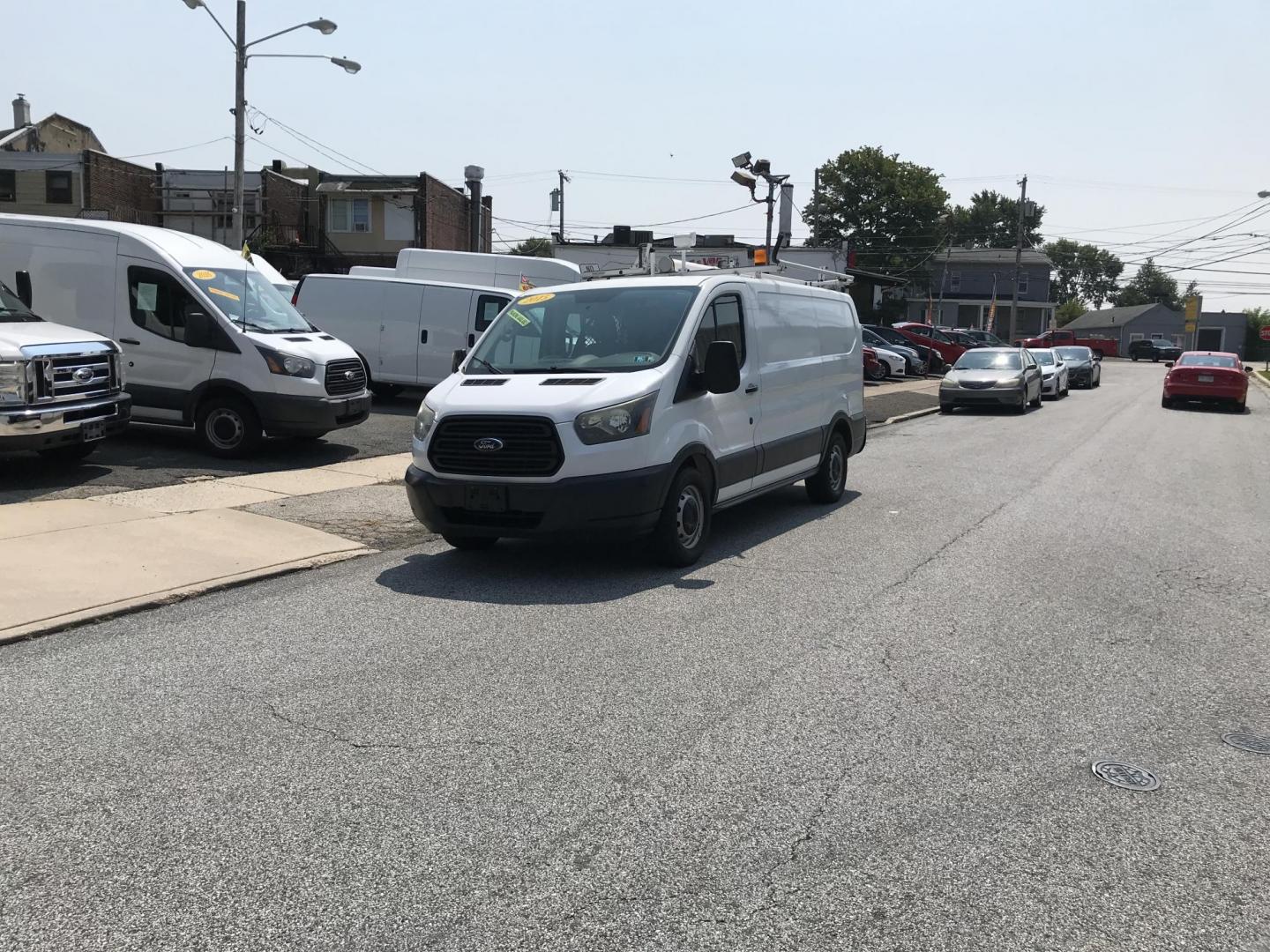 2015 White /Gray Ford Transit 150 Van Low Roof w/Sliding Pass. 130-in. WB (1FTNE1YM7FK) with an 3.7L V6 DOHC 24V engine, 6-Speed Automatic transmission, located at 577 Chester Pike, Prospect Park, PA, 19076, (610) 237-1015, 39.886154, -75.302338 - Photo#1