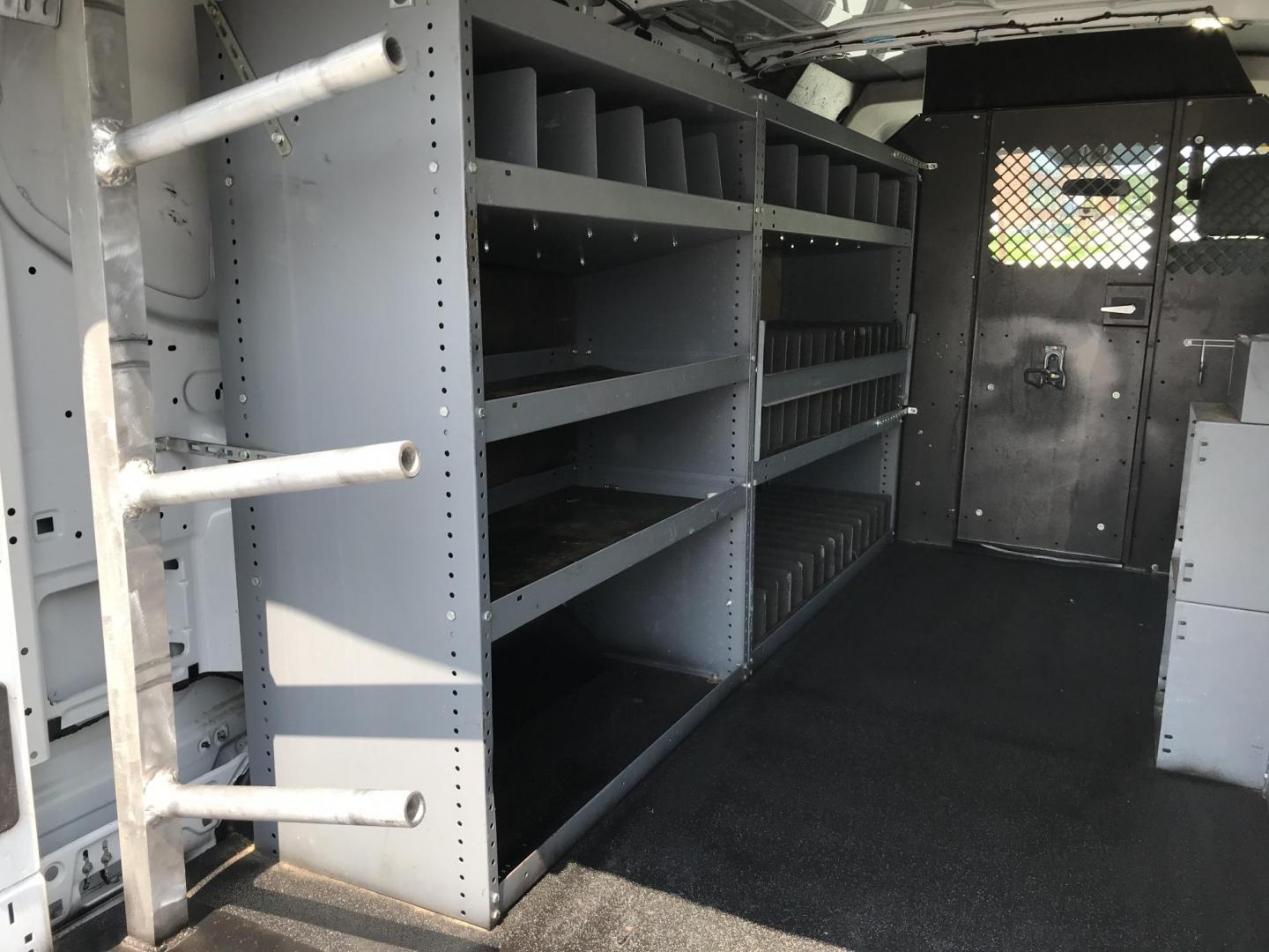 2015 White /Gray Ford Transit 150 Van Low Roof w/Sliding Pass. 130-in. WB (1FTNE1YM7FK) with an 3.7L V6 DOHC 24V engine, 6-Speed Automatic transmission, located at 577 Chester Pike, Prospect Park, PA, 19076, (610) 237-1015, 39.886154, -75.302338 - Photo#13