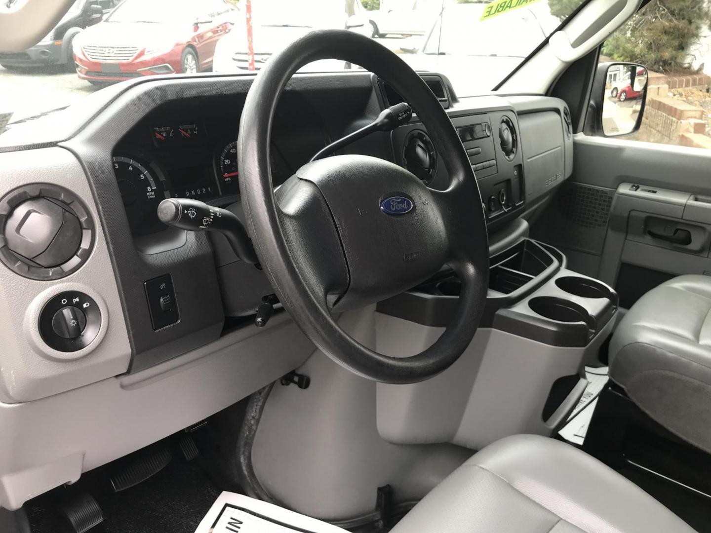 2013 White /Gray Ford Econoline E150 E-150 (1FTNE1EW4DD) with an 4.6L V8 SOHC 16V engine, 4-Speed Automatic transmission, located at 577 Chester Pike, Prospect Park, PA, 19076, (610) 237-1015, 39.886154, -75.302338 - 13 Ford Econoline E-150 Cargo Van: new PA inspection, shelving, power locks and windows, FLEET MAINTAINED! This vehicle comes inspected and has been given a bumper to bumper safety check. It is very clean, reliable, and well maintained. We offer a unique pay plan that is known for being the easie - Photo#10