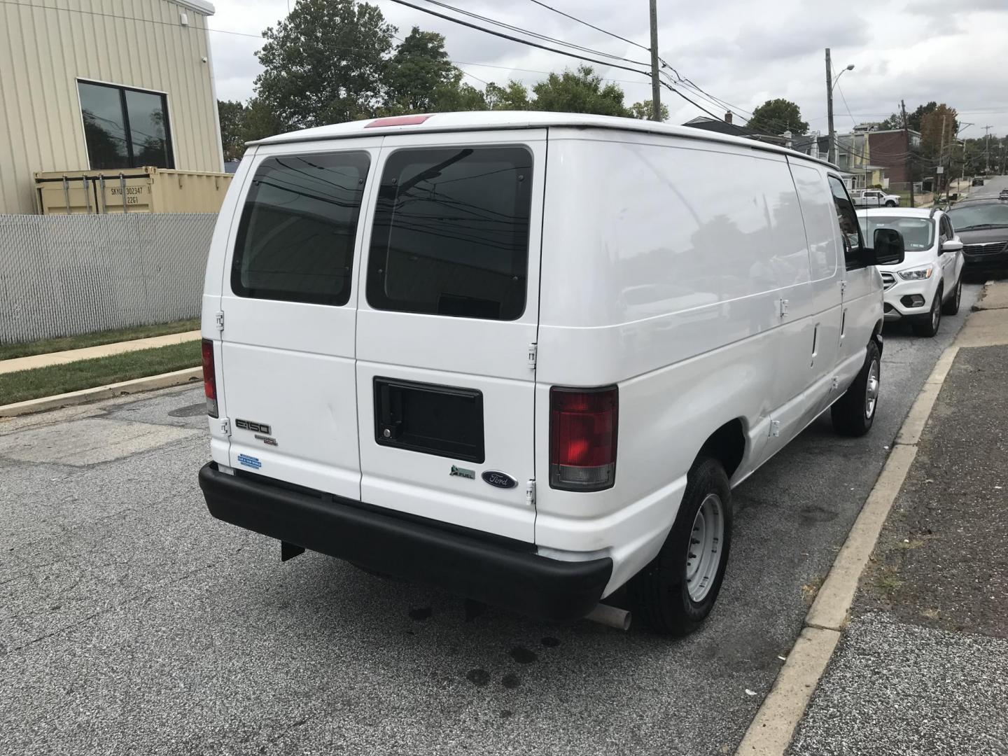 2013 White /Gray Ford Econoline E150 E-150 (1FTNE1EW4DD) with an 4.6L V8 SOHC 16V engine, 4-Speed Automatic transmission, located at 577 Chester Pike, Prospect Park, PA, 19076, (610) 237-1015, 39.886154, -75.302338 - 13 Ford Econoline E-150 Cargo Van: new PA inspection, shelving, power locks and windows, FLEET MAINTAINED! This vehicle comes inspected and has been given a bumper to bumper safety check. It is very clean, reliable, and well maintained. We offer a unique pay plan that is known for being the easie - Photo#3