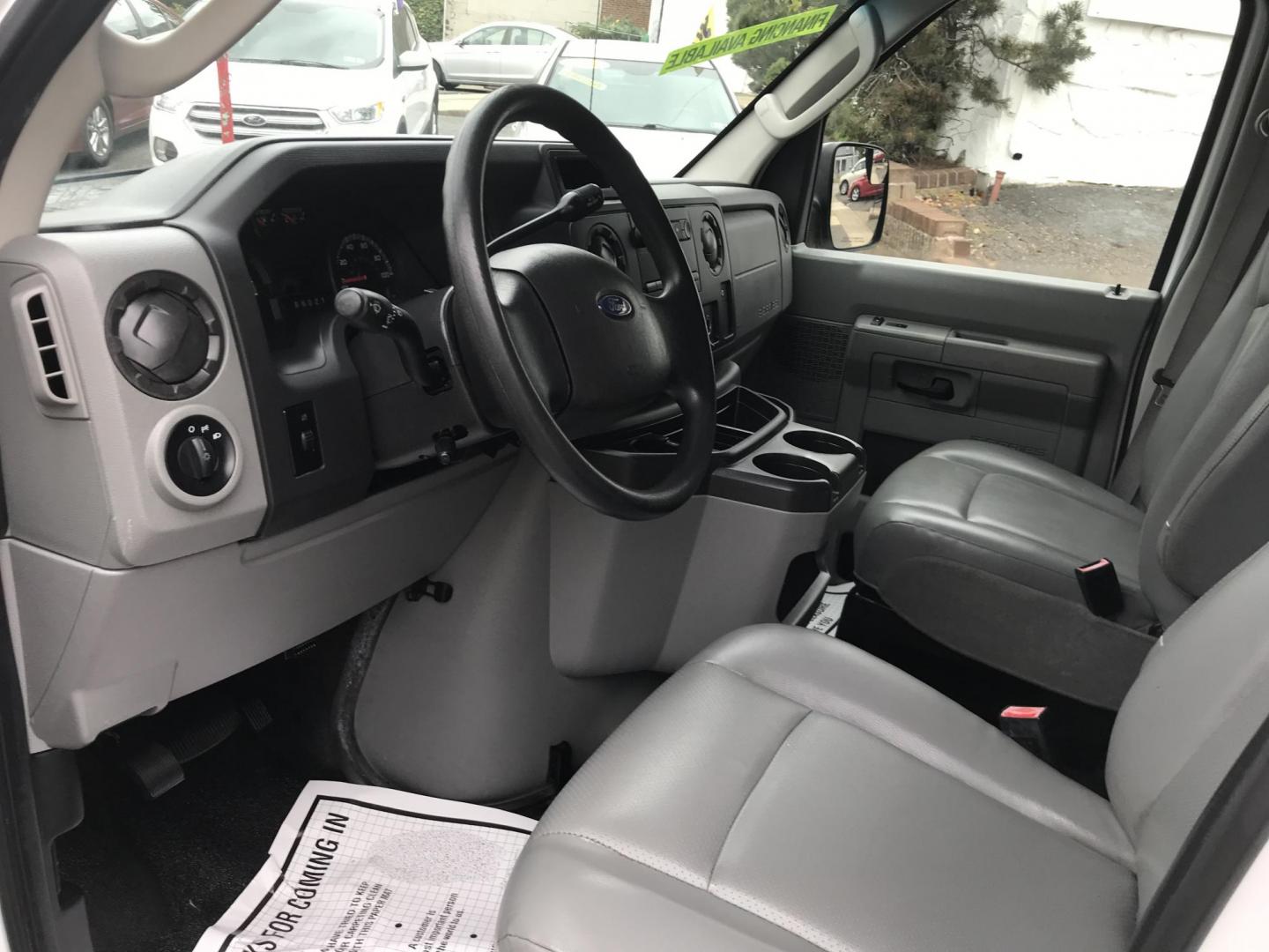 2013 White /Gray Ford Econoline E150 E-150 (1FTNE1EW4DD) with an 4.6L V8 SOHC 16V engine, 4-Speed Automatic transmission, located at 577 Chester Pike, Prospect Park, PA, 19076, (610) 237-1015, 39.886154, -75.302338 - 13 Ford Econoline E-150 Cargo Van: new PA inspection, shelving, power locks and windows, FLEET MAINTAINED! This vehicle comes inspected and has been given a bumper to bumper safety check. It is very clean, reliable, and well maintained. We offer a unique pay plan that is known for being the easie - Photo#6