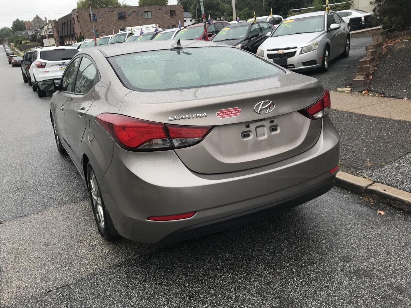 2015 Gray /Gray Hyundai Elantra SE (5NPDH4AE6FH) with an 1.8L L4 DOHC 16V engine, 6-Speed Automatic transmission, located at 577 Chester Pike, Prospect Park, PA, 19076, (610) 237-1015, 39.886154, -75.302338 - 2015 Hyundai Elantra SE: Great on gas, new PA inspection, SUPER CLEAN, runs LIKE NEW! This vehicle comes inspected and has been given a bumper to bumper safety check. It is very clean, reliable, and well maintained. We offer a unique pay plan that is known for being the easiest and fastest financ - Photo#5