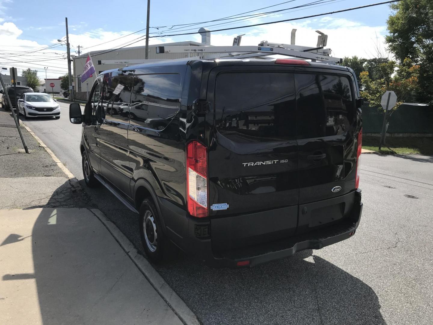 2016 Black /Gray Ford Transit 150 Van Low Roof w/Sliding Pass. 130-in. WB (1FTYE1YM4GK) with an 3.7L V6 DOHC 24V engine, 6A transmission, located at 577 Chester Pike, Prospect Park, PA, 19076, (610) 237-1015, 39.886154, -75.302338 - Photo#5