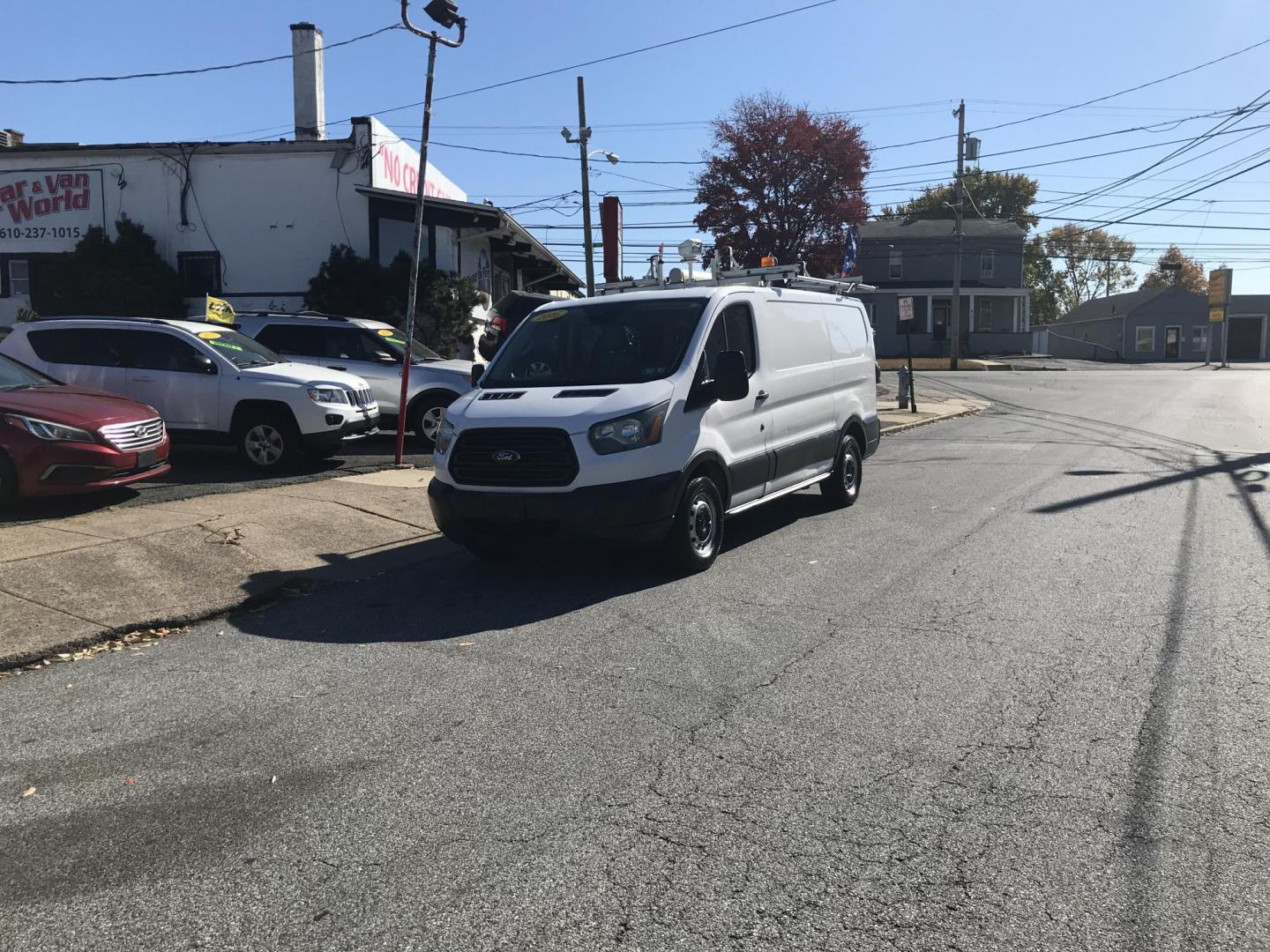 2016 White /Gray Ford Transit 150 Van Low Roof w/Sliding Pass. 130-in. WB (1FTYE1YM0GK) with an 3.7L V6 DOHC 24V engine, 6A transmission, located at 577 Chester Pike, Prospect Park, PA, 19076, (610) 237-1015, 39.886154, -75.302338 - Photo#2