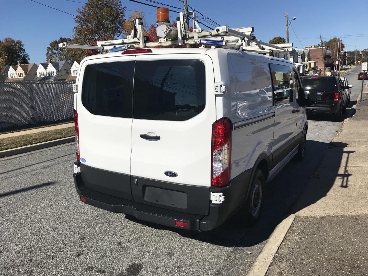 2016 White /Gray Ford Transit 150 Van Low Roof w/Sliding Pass. 130-in. WB (1FTYE1YM0GK) with an 3.7L V6 DOHC 24V engine, 6A transmission, located at 577 Chester Pike, Prospect Park, PA, 19076, (610) 237-1015, 39.886154, -75.302338 - Photo#4