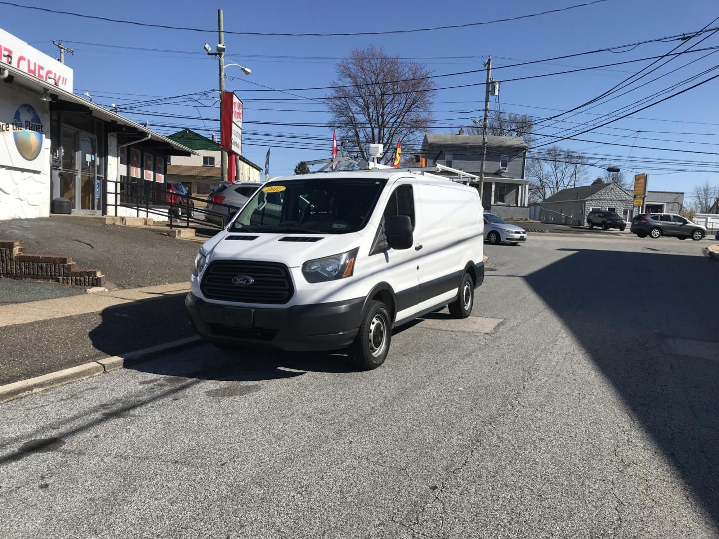 2015 White /Gray Ford Transit 150 Van Med. Roof w/Sliding Pass. 130-in. WB (1FTNE1YMXFK) with an 3.7L V6 DOHC 24V engine, 6-Speed Automatic transmission, located at 577 Chester Pike, Prospect Park, PA, 19076, (610) 237-1015, 39.886154, -75.302338 - 2015 Ford Transit 150 Low Roof: Only 102k miles, drop down ladder racks, shelving, power inverter, partition, new PA inspection, FLEET MAINTAINED! This vehicle comes inspected and has been given a bumper to bumper safety check. It is very clean, reliable, and well maintained. We offer a unique pa - Photo#1