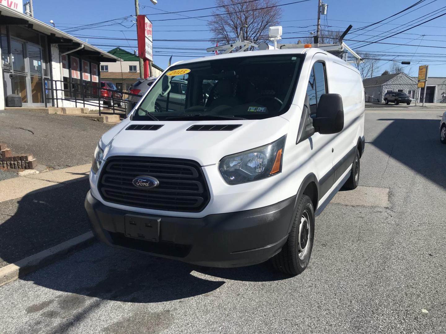2015 White /Gray Ford Transit 150 Van Med. Roof w/Sliding Pass. 130-in. WB (1FTNE1YMXFK) with an 3.7L V6 DOHC 24V engine, 6-Speed Automatic transmission, located at 577 Chester Pike, Prospect Park, PA, 19076, (610) 237-1015, 39.886154, -75.302338 - 2015 Ford Transit 150 Low Roof: Only 102k miles, drop down ladder racks, shelving, power inverter, partition, new PA inspection, FLEET MAINTAINED! This vehicle comes inspected and has been given a bumper to bumper safety check. It is very clean, reliable, and well maintained. We offer a unique pa - Photo#2