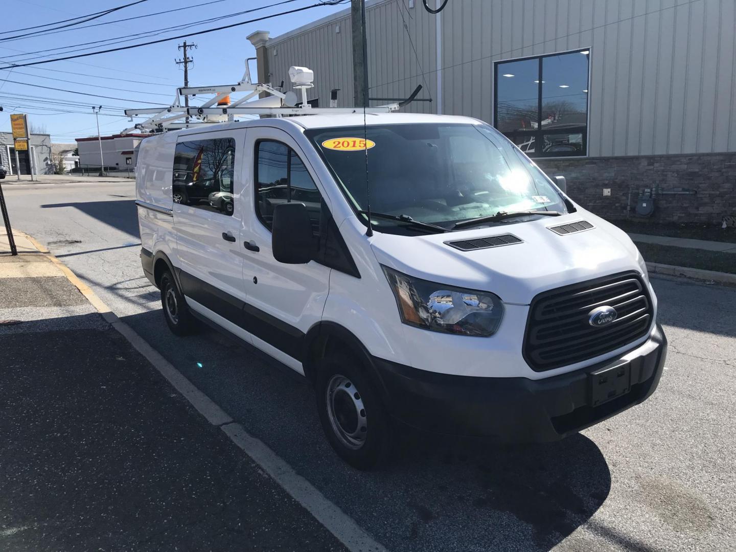 2015 White /Gray Ford Transit 150 Van Med. Roof w/Sliding Pass. 130-in. WB (1FTNE1YMXFK) with an 3.7L V6 DOHC 24V engine, 6-Speed Automatic transmission, located at 577 Chester Pike, Prospect Park, PA, 19076, (610) 237-1015, 39.886154, -75.302338 - 2015 Ford Transit 150 Low Roof: Only 102k miles, drop down ladder racks, shelving, power inverter, partition, new PA inspection, FLEET MAINTAINED! This vehicle comes inspected and has been given a bumper to bumper safety check. It is very clean, reliable, and well maintained. We offer a unique pa - Photo#3