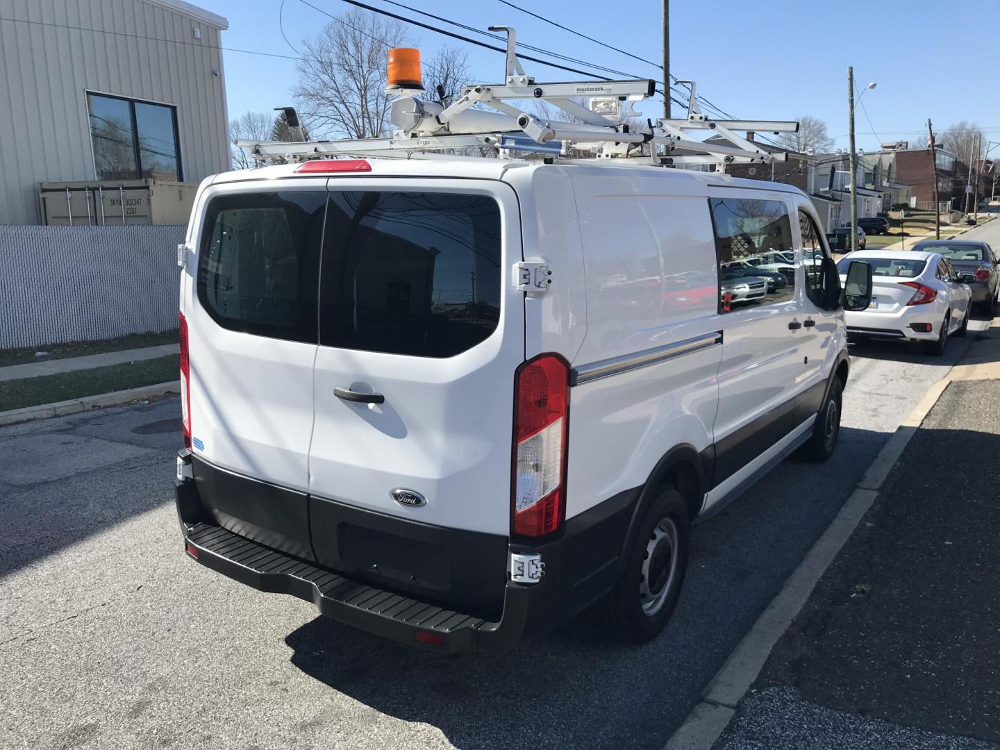 2015 White /Gray Ford Transit 150 Van Med. Roof w/Sliding Pass. 130-in. WB (1FTNE1YMXFK) with an 3.7L V6 DOHC 24V engine, 6-Speed Automatic transmission, located at 577 Chester Pike, Prospect Park, PA, 19076, (610) 237-1015, 39.886154, -75.302338 - 2015 Ford Transit 150 Low Roof: Only 102k miles, drop down ladder racks, shelving, power inverter, partition, new PA inspection, FLEET MAINTAINED! This vehicle comes inspected and has been given a bumper to bumper safety check. It is very clean, reliable, and well maintained. We offer a unique pa - Photo#4