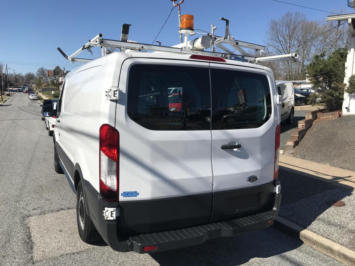 2015 White /Gray Ford Transit 150 Van Med. Roof w/Sliding Pass. 130-in. WB (1FTNE1YMXFK) with an 3.7L V6 DOHC 24V engine, 6-Speed Automatic transmission, located at 577 Chester Pike, Prospect Park, PA, 19076, (610) 237-1015, 39.886154, -75.302338 - 2015 Ford Transit 150 Low Roof: Only 102k miles, drop down ladder racks, shelving, power inverter, partition, new PA inspection, FLEET MAINTAINED! This vehicle comes inspected and has been given a bumper to bumper safety check. It is very clean, reliable, and well maintained. We offer a unique pa - Photo#7