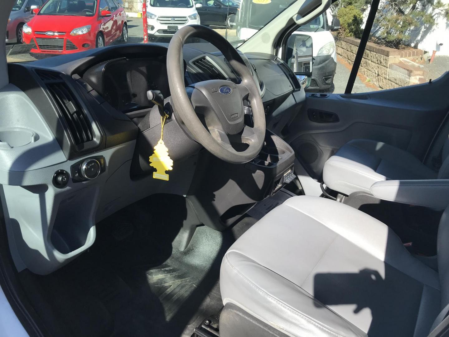 2015 White /Gray Ford Transit 150 Van Med. Roof w/Sliding Pass. 130-in. WB (1FTNE1YMXFK) with an 3.7L V6 DOHC 24V engine, 6-Speed Automatic transmission, located at 577 Chester Pike, Prospect Park, PA, 19076, (610) 237-1015, 39.886154, -75.302338 - 2015 Ford Transit 150 Low Roof: Only 102k miles, drop down ladder racks, shelving, power inverter, partition, new PA inspection, FLEET MAINTAINED! This vehicle comes inspected and has been given a bumper to bumper safety check. It is very clean, reliable, and well maintained. We offer a unique pa - Photo#8