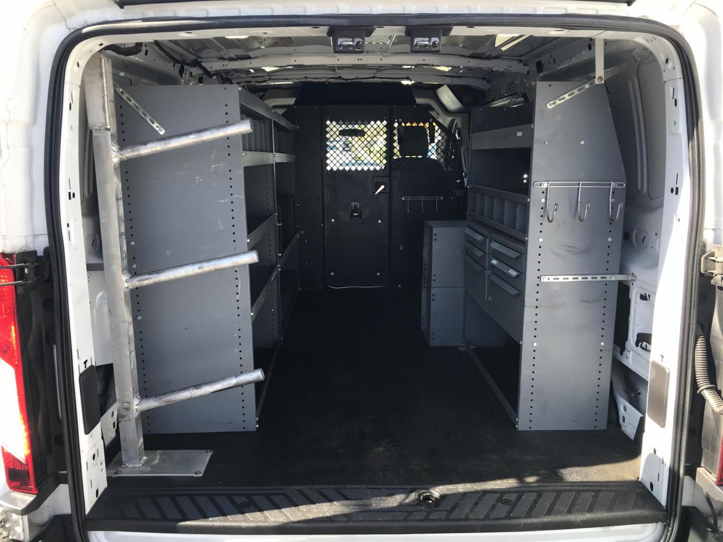 2015 White /Gray Ford Transit 150 Van Med. Roof w/Sliding Pass. 130-in. WB (1FTNE1YMXFK) with an 3.7L V6 DOHC 24V engine, 6-Speed Automatic transmission, located at 577 Chester Pike, Prospect Park, PA, 19076, (610) 237-1015, 39.886154, -75.302338 - 2015 Ford Transit 150 Low Roof: Only 102k miles, drop down ladder racks, shelving, power inverter, partition, new PA inspection, FLEET MAINTAINED! This vehicle comes inspected and has been given a bumper to bumper safety check. It is very clean, reliable, and well maintained. We offer a unique pa - Photo#16