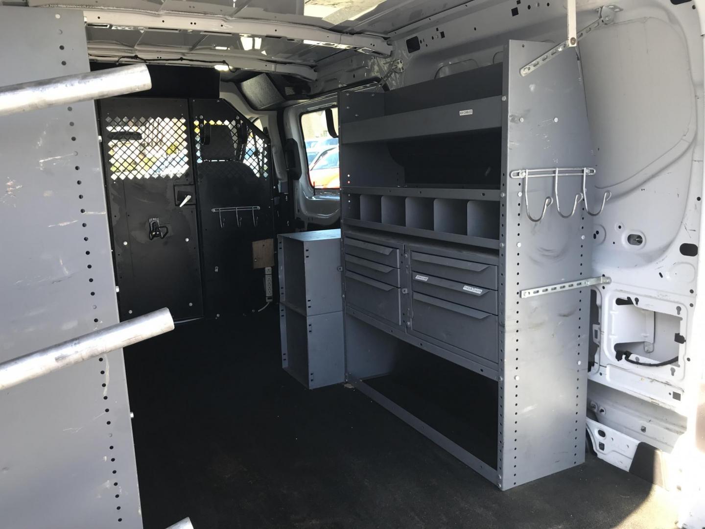 2015 White /Gray Ford Transit 150 Van Med. Roof w/Sliding Pass. 130-in. WB (1FTNE1YMXFK) with an 3.7L V6 DOHC 24V engine, 6-Speed Automatic transmission, located at 577 Chester Pike, Prospect Park, PA, 19076, (610) 237-1015, 39.886154, -75.302338 - 2015 Ford Transit 150 Low Roof: Only 102k miles, drop down ladder racks, shelving, power inverter, partition, new PA inspection, FLEET MAINTAINED! This vehicle comes inspected and has been given a bumper to bumper safety check. It is very clean, reliable, and well maintained. We offer a unique pa - Photo#17