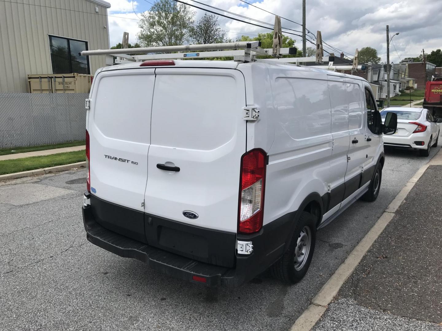 2017 White /Gray Ford Transit 150 Van Low Roof 60/40 Pass. 130-in. WB (1FTYE1ZM4HK) with an 3.7L V6 DOHC 24V engine, 6A transmission, located at 577 Chester Pike, Prospect Park, PA, 19076, (610) 237-1015, 39.886154, -75.302338 - 2017 Ford Transit 150 Low Roof: No side or rear windows, ladder racks, shelving, partition, new PA inspection, SUPER CLEAN, FLEET MAINTAINED! This vehicle comes inspected and has been given a bumper to bumper safety check. It is very clean, reliable, and well maintained. We offer a unique pay pla - Photo#4