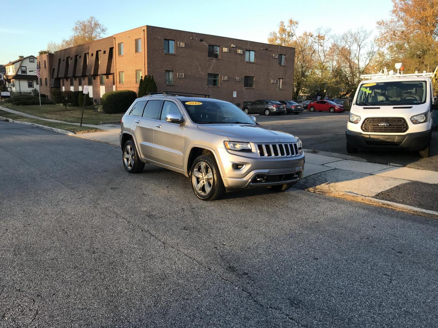 2015 Silver /Black Jeep Grand Cherokee Overland 4WD (1C4RJFCT3FC) with an 5.7L V8 OHV 16V engine, 8-Speed Automatic transmission, located at 577 Chester Pike, Prospect Park, PA, 19076, (610) 237-1015, 39.886154, -75.302338 - 2015 Jeep Grand Cherokee Overland: Sunroof, backup camera, trailer hitch, black leather interior, 4x4, SUPER CLEAN and runs LIKE NEW! This vehicle comes inspected and has been given a bumper to bumper safety check. It is very clean, reliable, and well maintained. We offer a unique pay plan that i - Photo#1