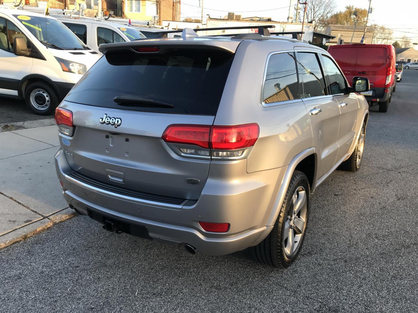 2015 Silver /Black Jeep Grand Cherokee Overland 4WD (1C4RJFCT3FC) with an 5.7L V8 OHV 16V engine, 8-Speed Automatic transmission, located at 577 Chester Pike, Prospect Park, PA, 19076, (610) 237-1015, 39.886154, -75.302338 - 2015 Jeep Grand Cherokee Overland: Sunroof, backup camera, trailer hitch, black leather interior, 4x4, SUPER CLEAN and runs LIKE NEW! This vehicle comes inspected and has been given a bumper to bumper safety check. It is very clean, reliable, and well maintained. We offer a unique pay plan that i - Photo#7