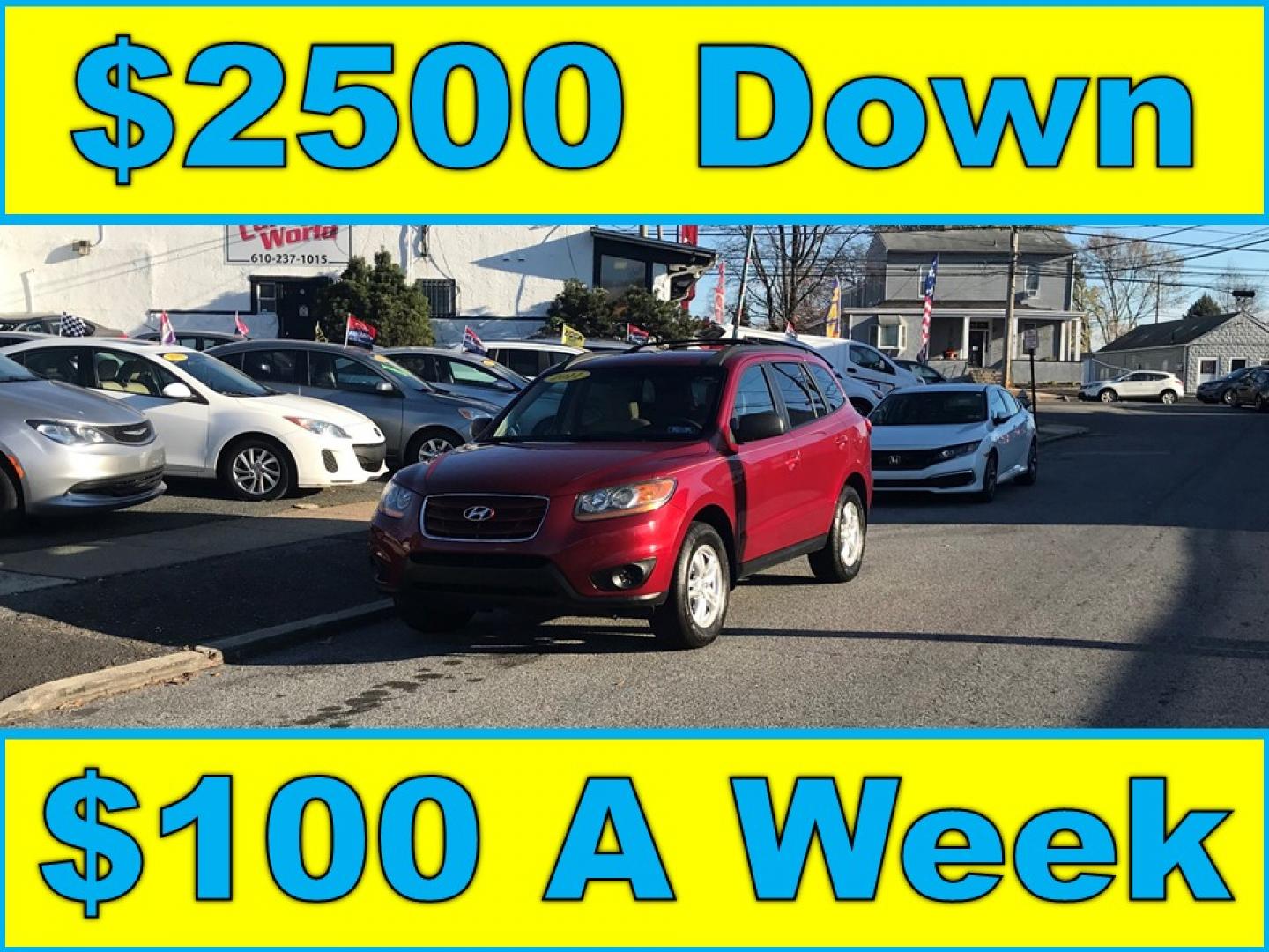 2011 Red /Tan Hyundai Santa Fe GLS 2.4 (5XYZG3AB8BG) with an 2.4L L4 DOHC 16V engine, 6-Speed Automatic transmission, located at 577 Chester Pike, Prospect Park, PA, 19076, (610) 237-1015, 39.886154, -75.302338 - Photo#0
